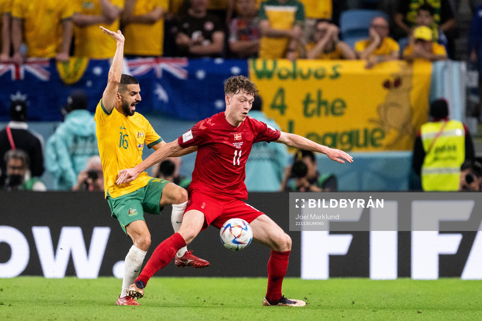 Aziz Behich of Australia and Andreas Skov Olsen of Denmark