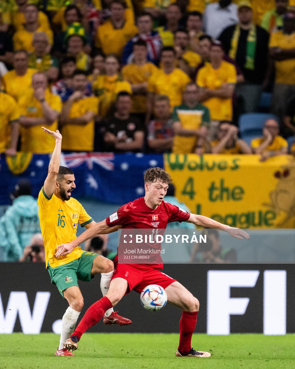 Aziz Behich of Australia and Andreas Skov Olsen of Denmark