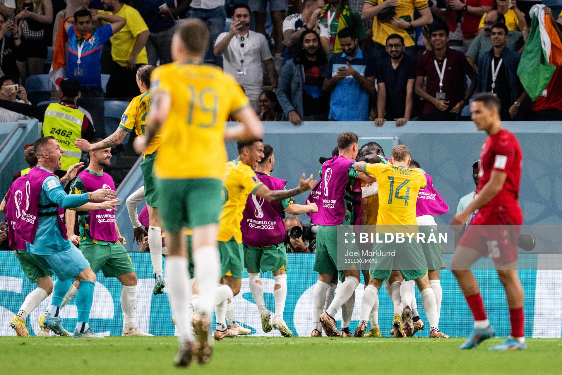 Mathew Leckie of Australia celebrate with team mates after the 1-0 goal during the FIFA World Cup 2022 football match between Australia and Denmark on November 30, 2022 in Doha.