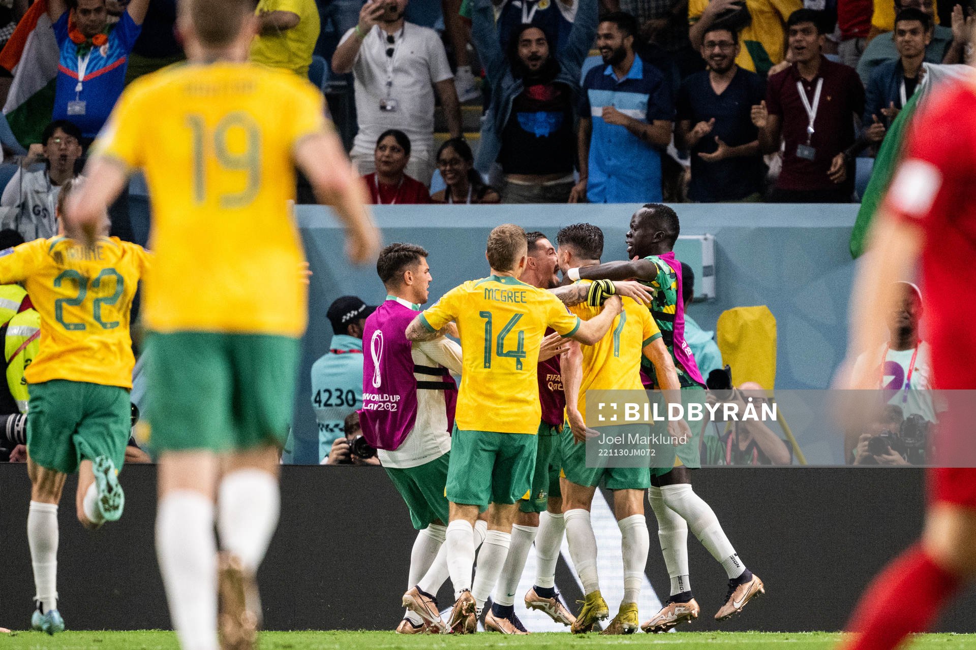 Mathew Leckie of Australia celebrate with team mates