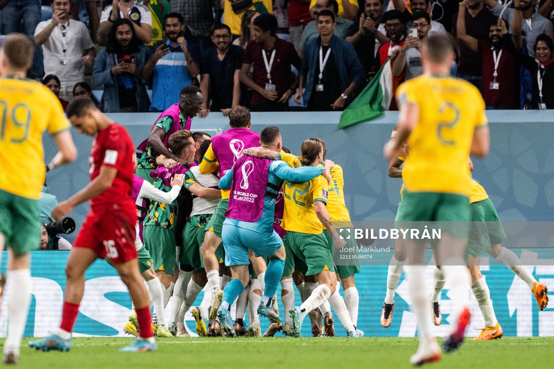 Mathew Leckie of Australia celebrate with team mates after the 1-0 goal during the FIFA World Cup 2022 football match between Australia and Denmark on November 30, 2022 in Doha.