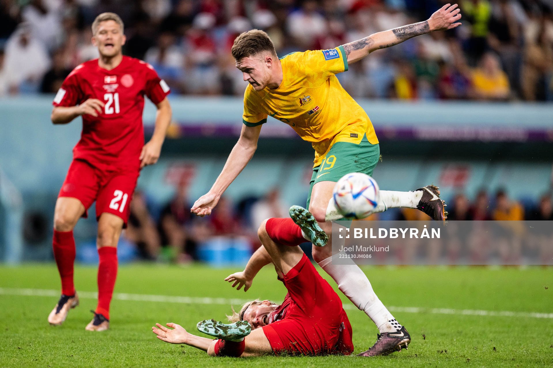 Kasper Dolberg of Denmark and Harry Souttar of Australia in
