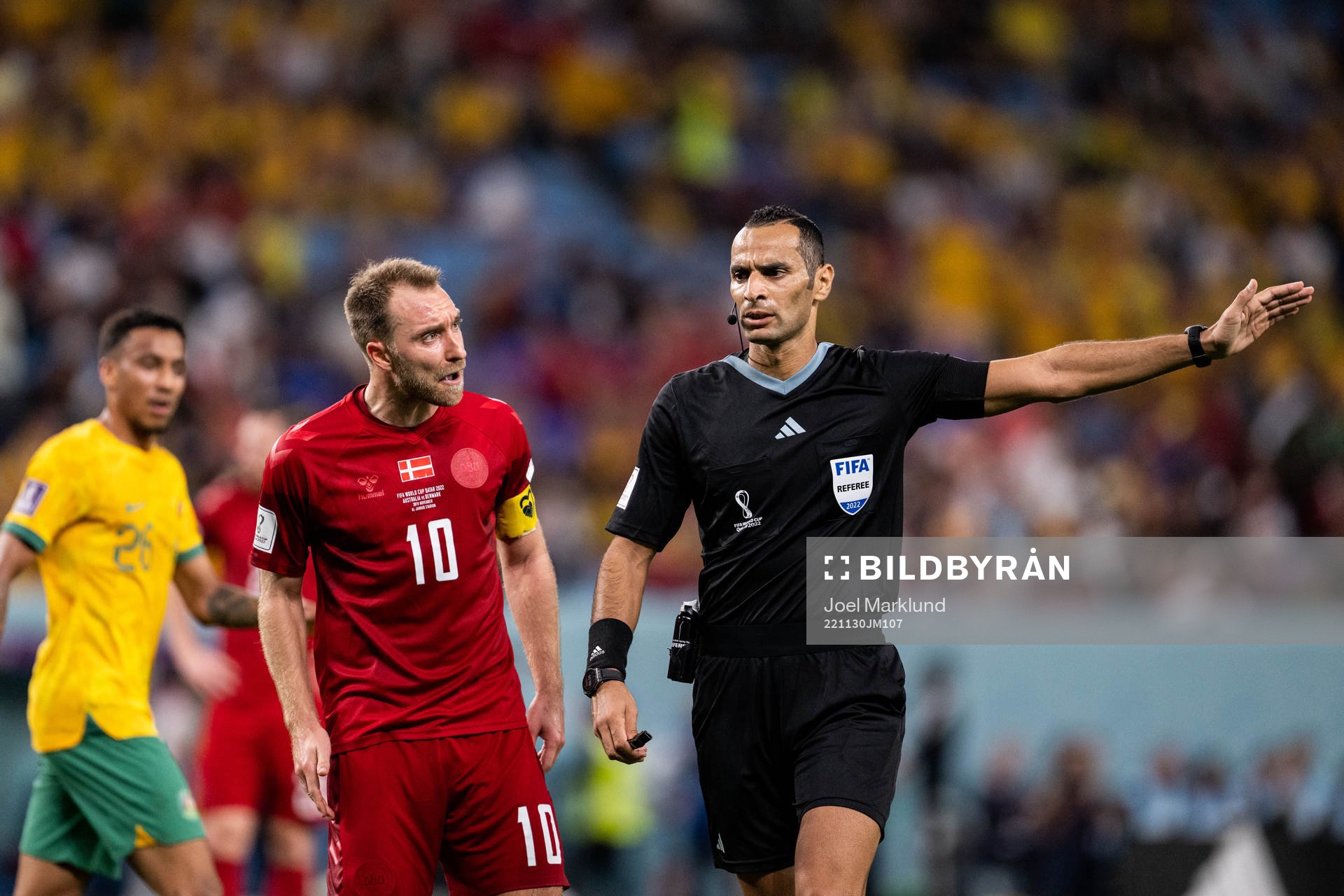 Christian Eriksen of Denmark reacts against referee