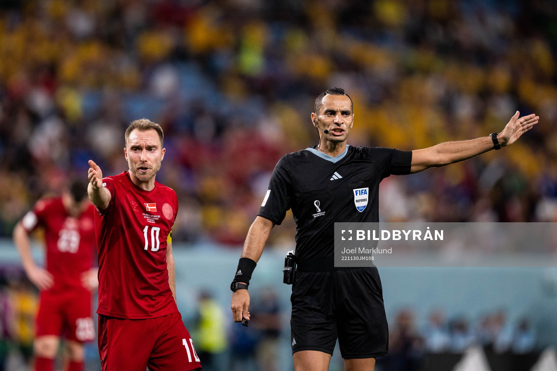 Christian Eriksen of Denmark reacts against referee