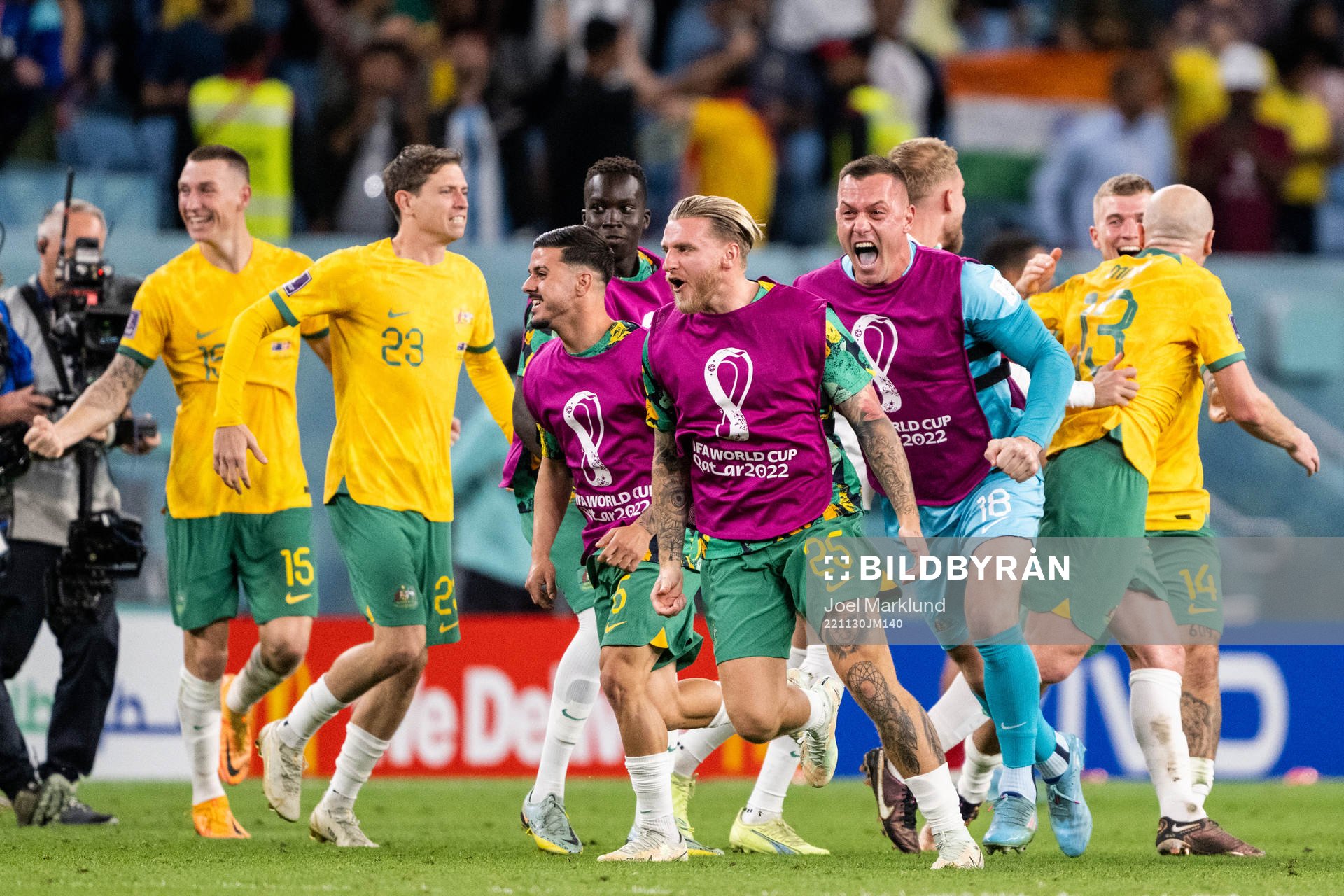 Jason Cummings and goalkeeper Danny Vukovic of Australia
