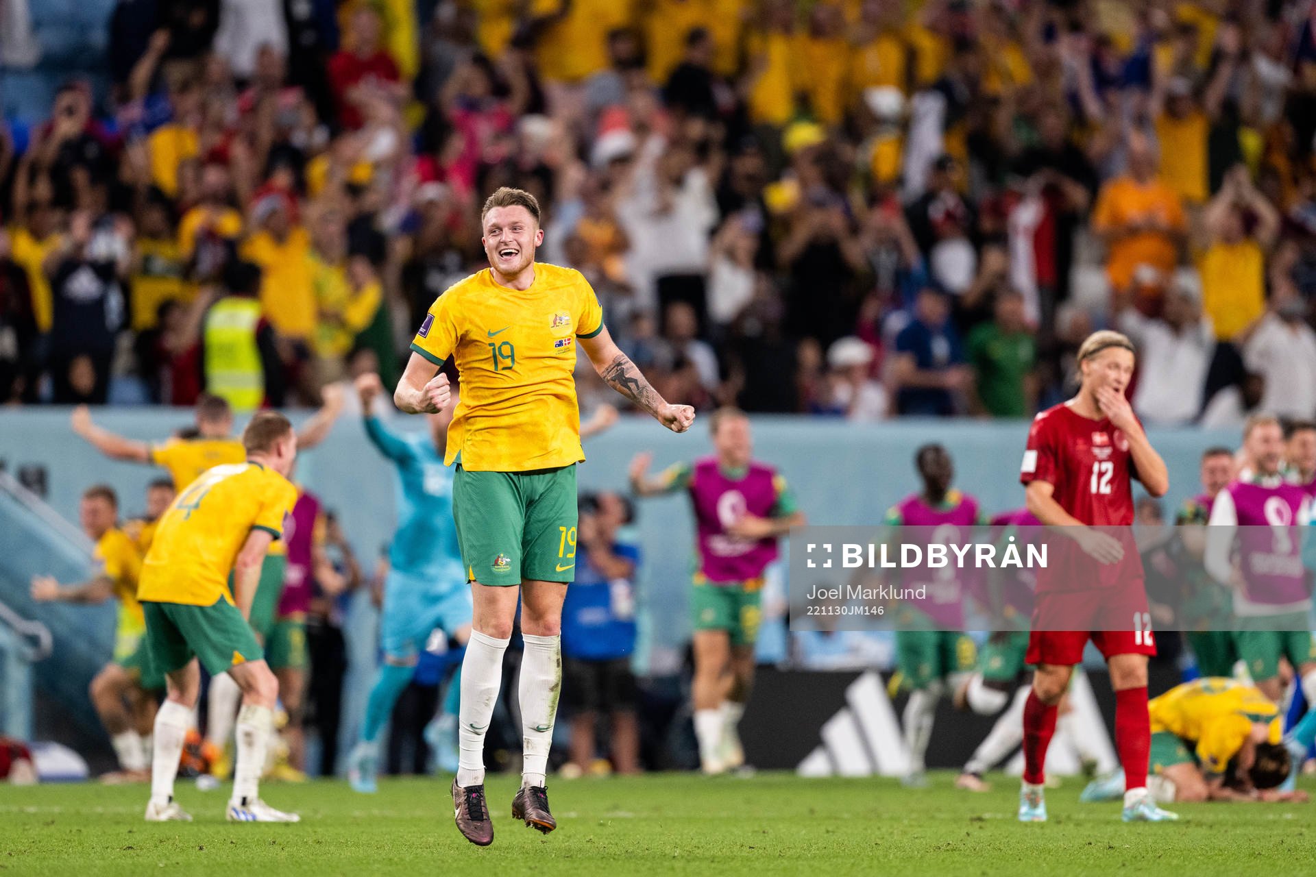 Jonas Wind of Australia celebrate after the FIFA World Cup 2022 football match between Australia and Denmark on November 30, 2022 in Doha.