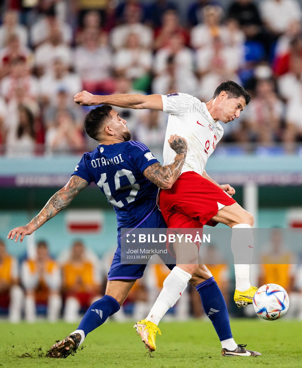 Nicolas Otamendi of Argentina and Robert Lewandowski of