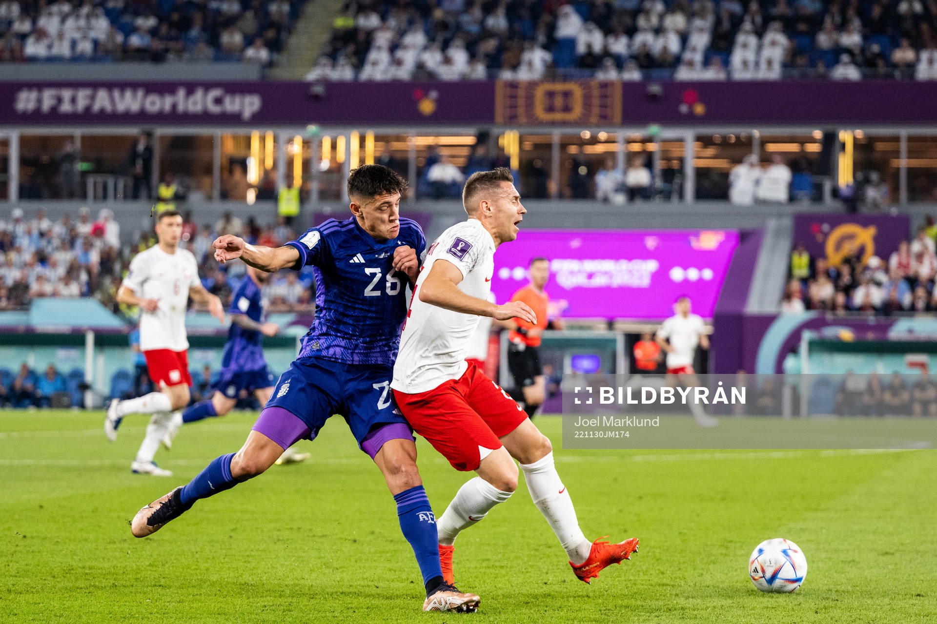 Nahuel Molina of Argentina and Przemyslaw Frankowski of