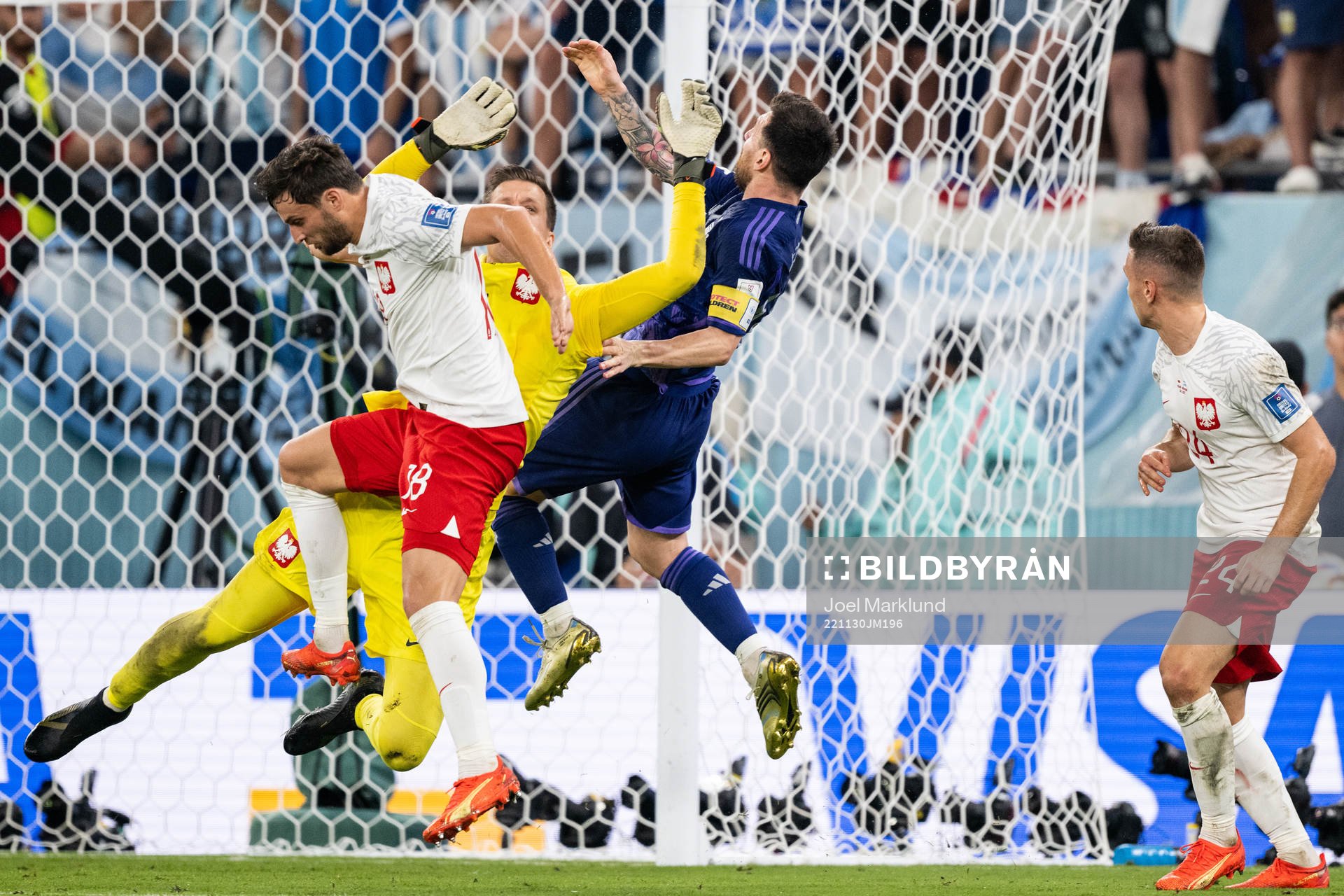 Goalkeeper Wojciech Szczesny of Poland in a situation with Lionel Messi of Argentina that leads to a penalty for Argentina during the FIFA World Cup 2022 football match between Poland and Argentina on November 30, 2022 in Doha.