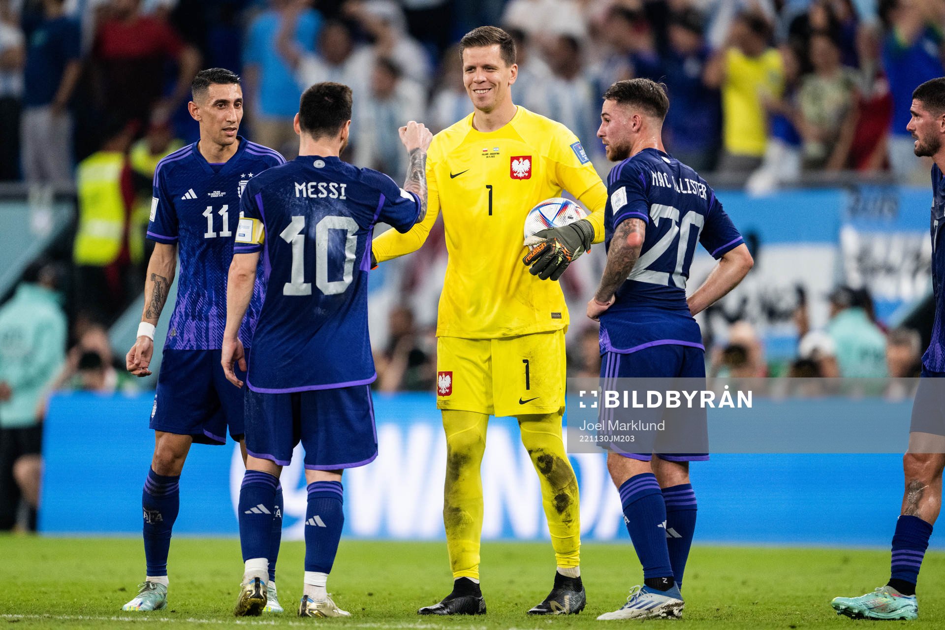 Goalkeeper Wojciech Szczesny of Poland and Lionel Messi of