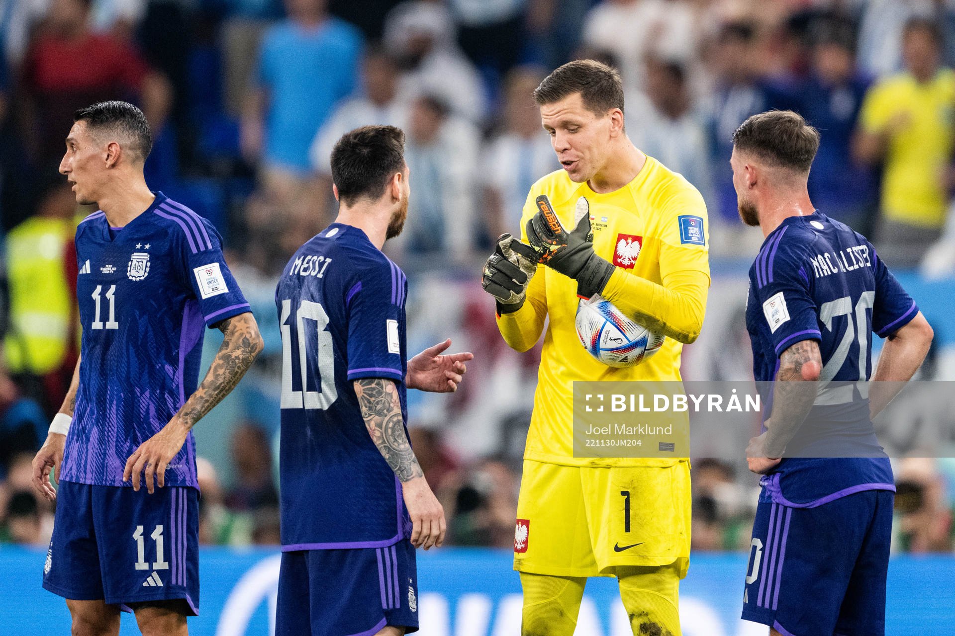 Goalkeeper Wojciech Szczesny of Poland and Lionel Messi of