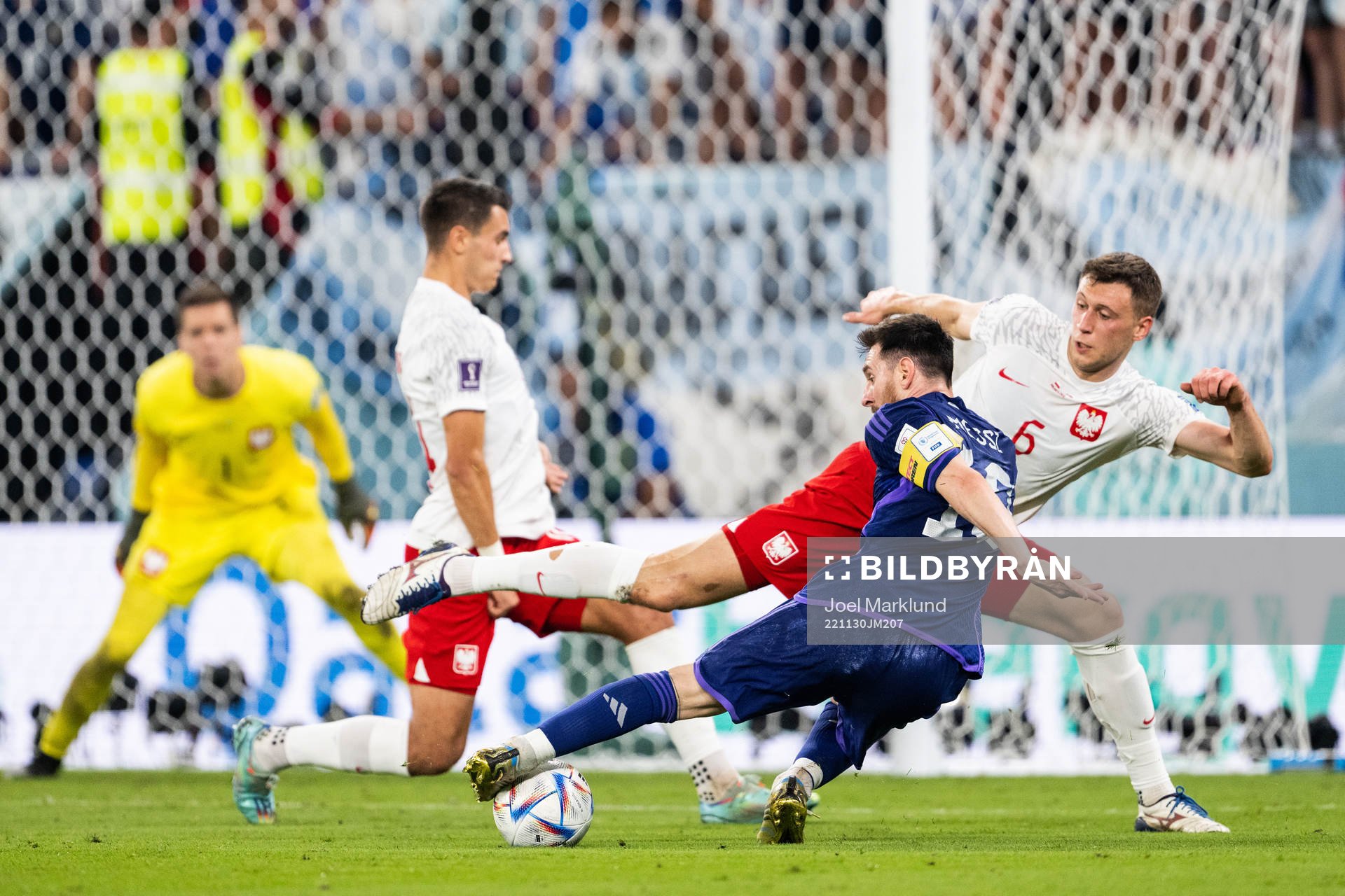 Lionel Messi of Argentina and Krystian Bielik of Poland