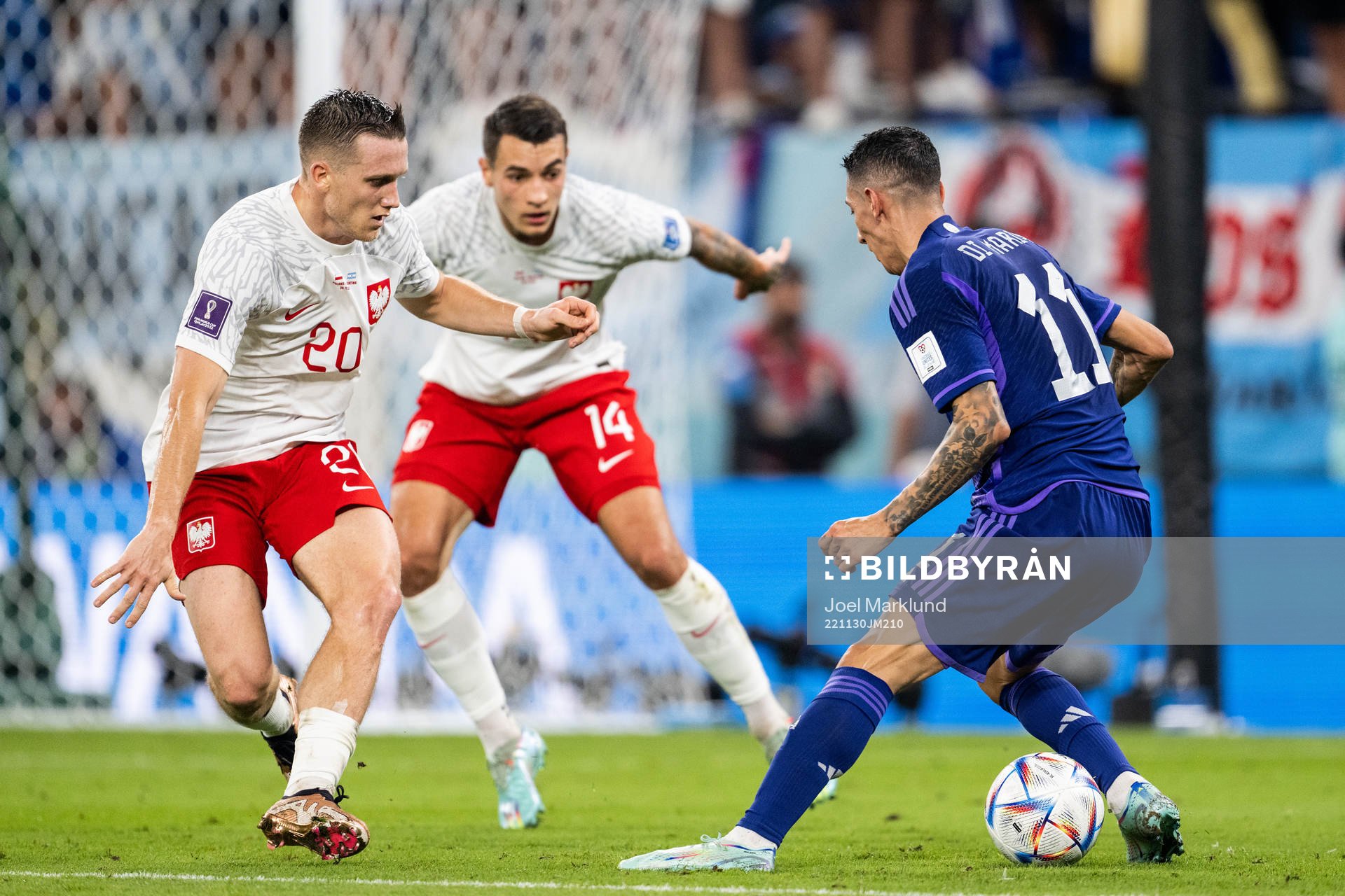 Piotr Zielinski and Jakub Kiwior of Poland against Angel de