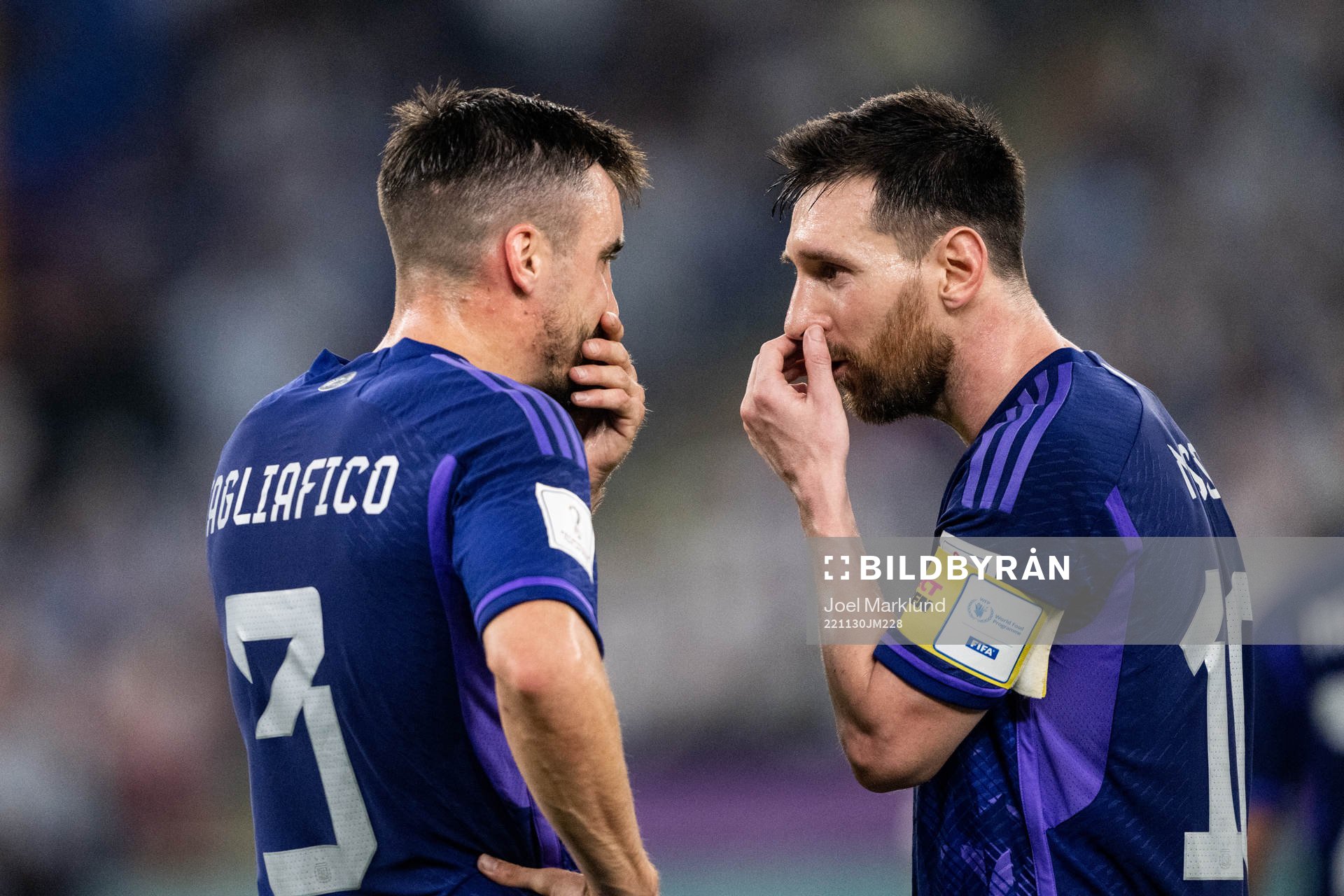 Nicolas Tagliafico and Lionel Messi of Argentina