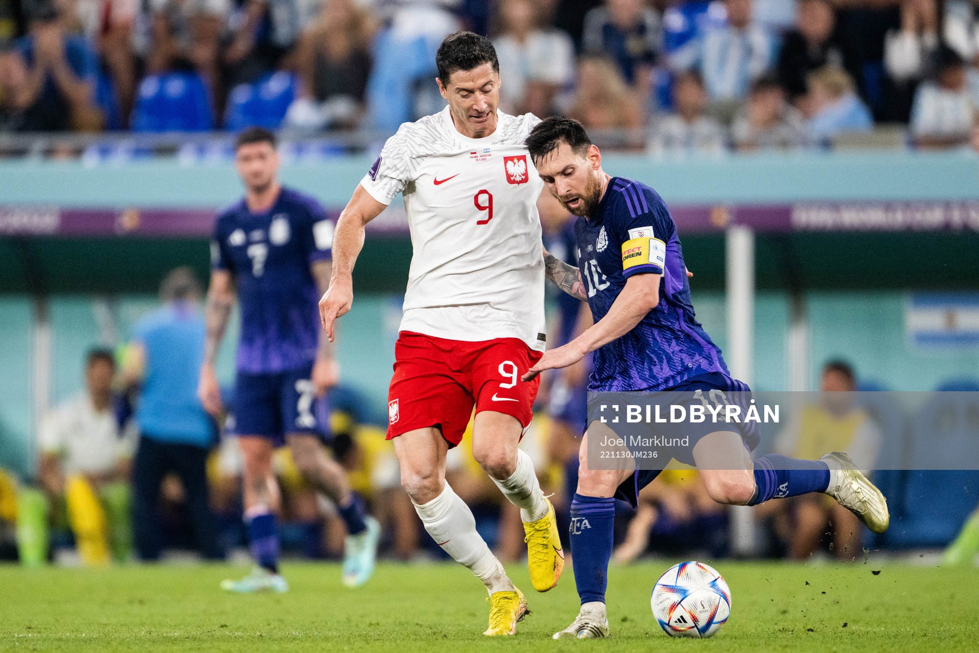 Robert Lewandowski of Poland and Lionel Messi of Argentina