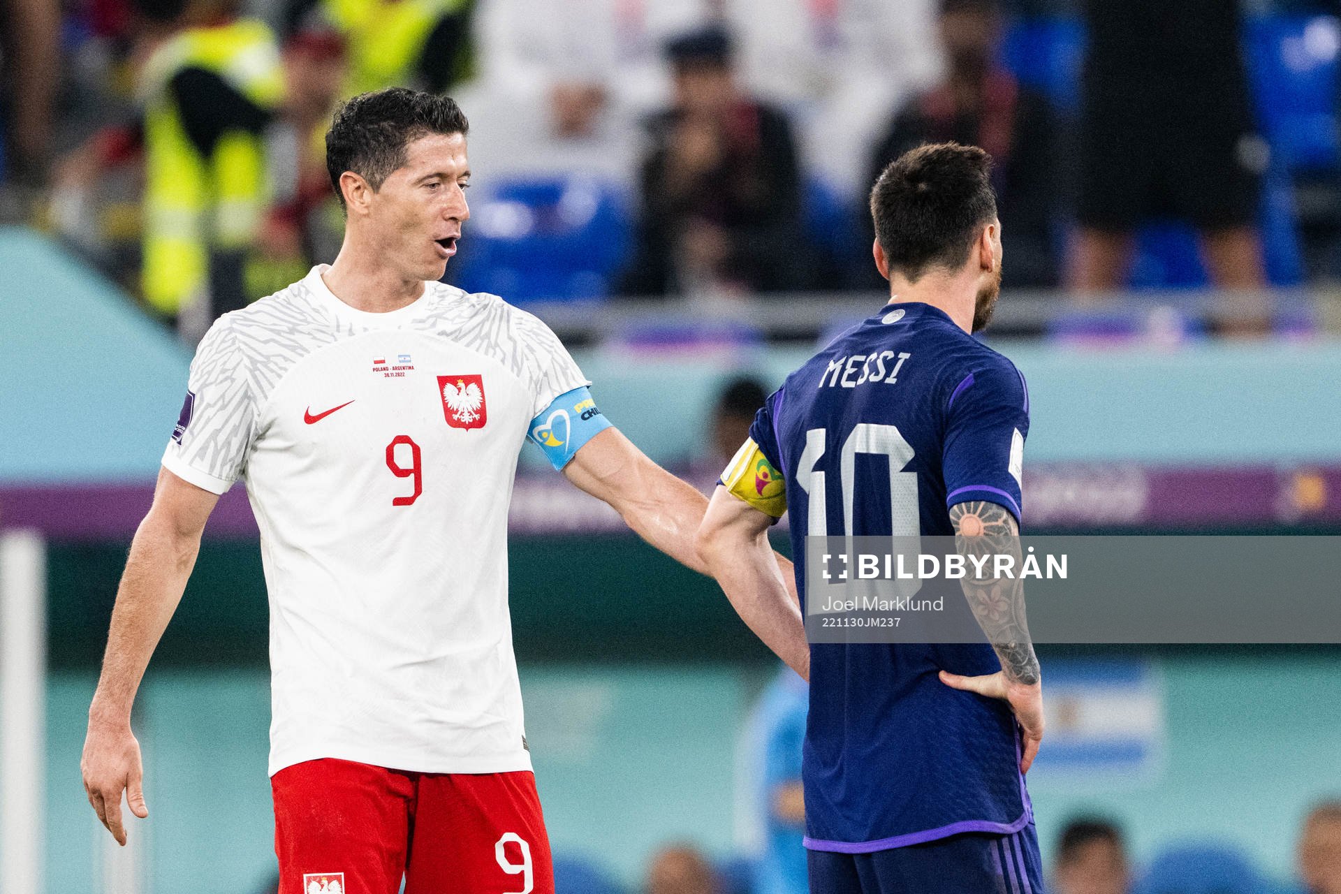 Robert Lewandowski of Poland and Lionel Messi of Argentina