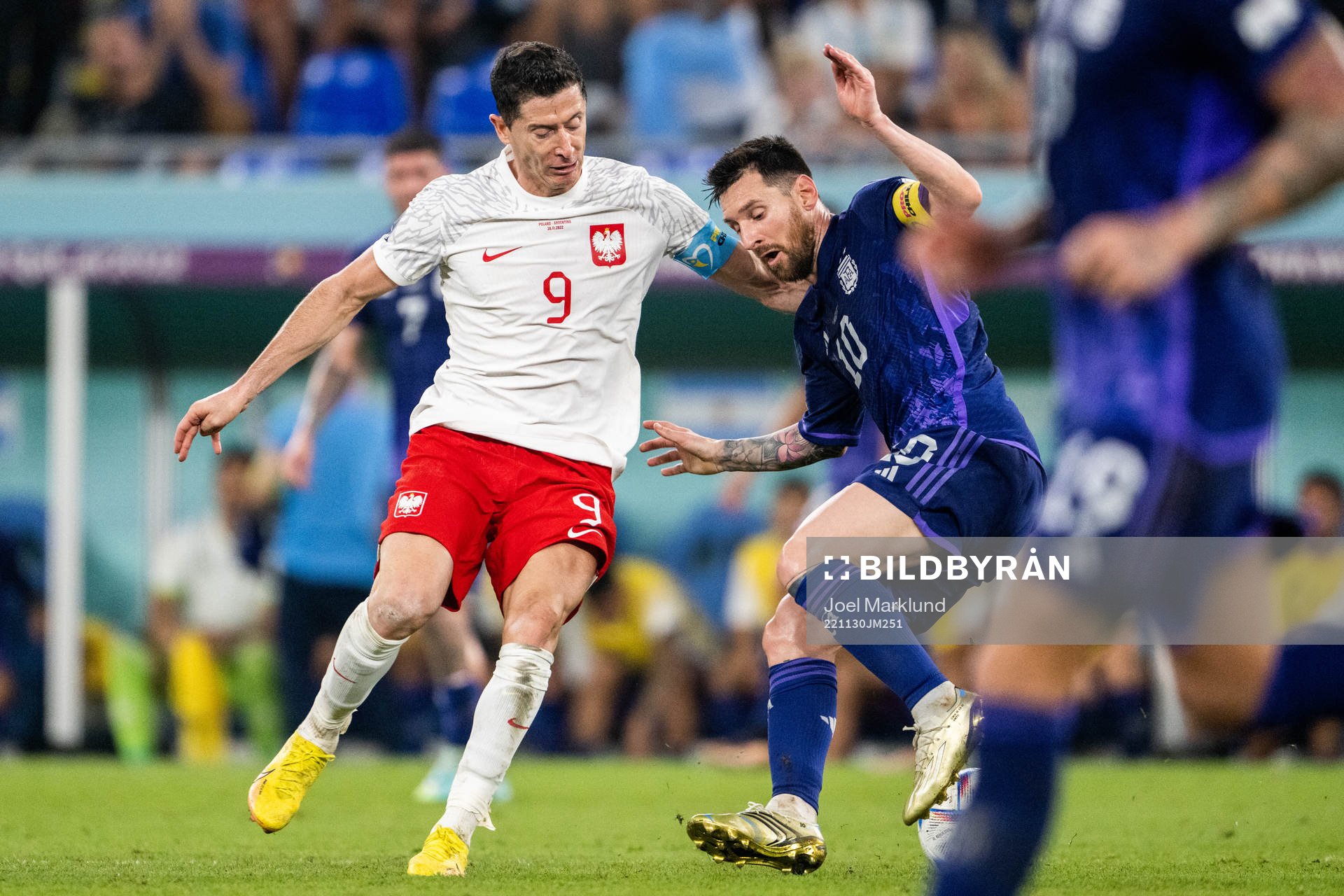 Robert Lewandowski of Poland and Lionel Messi of Argentina
