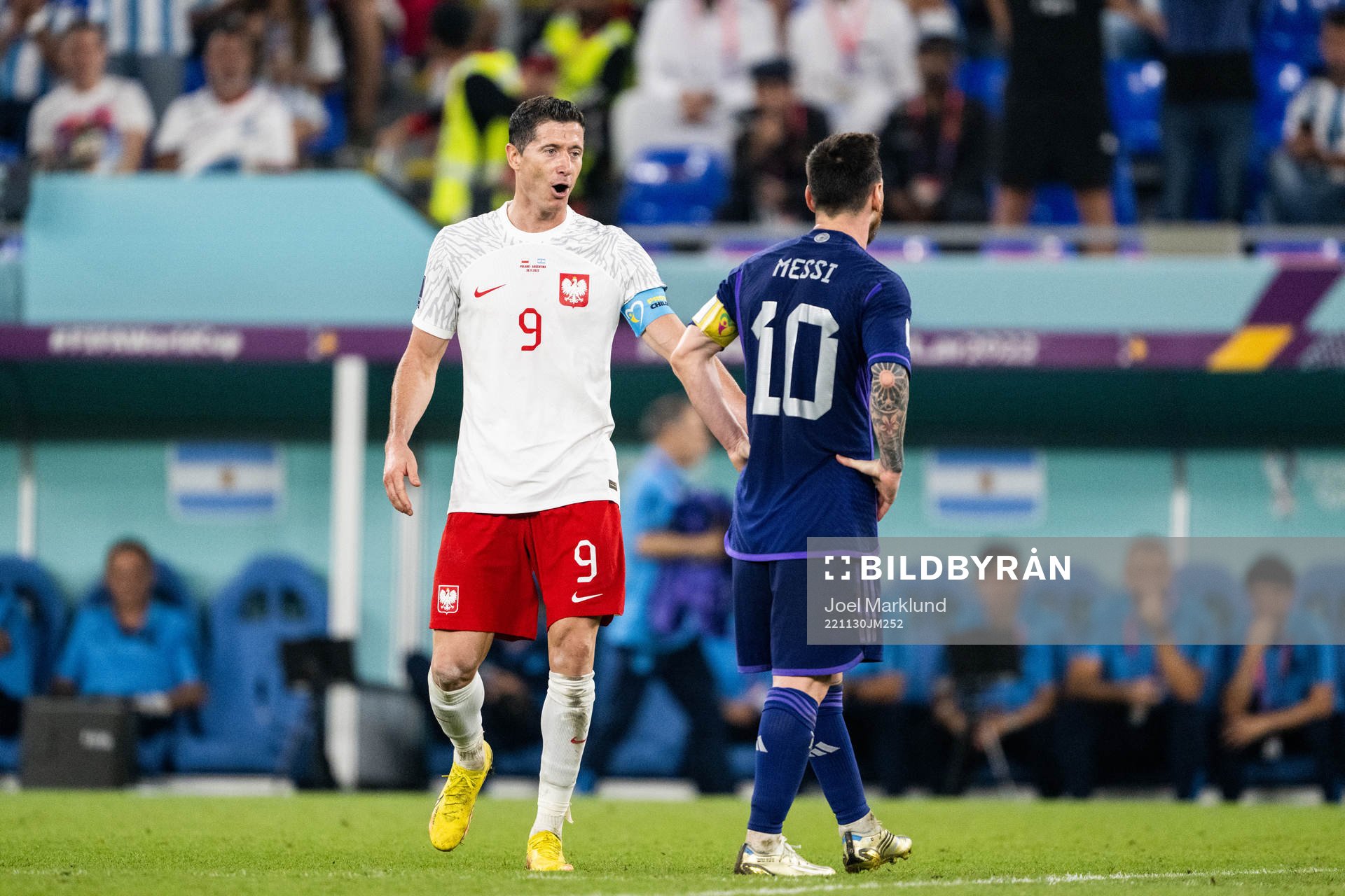 Robert Lewandowski of Poland and Lionel Messi of Argentina