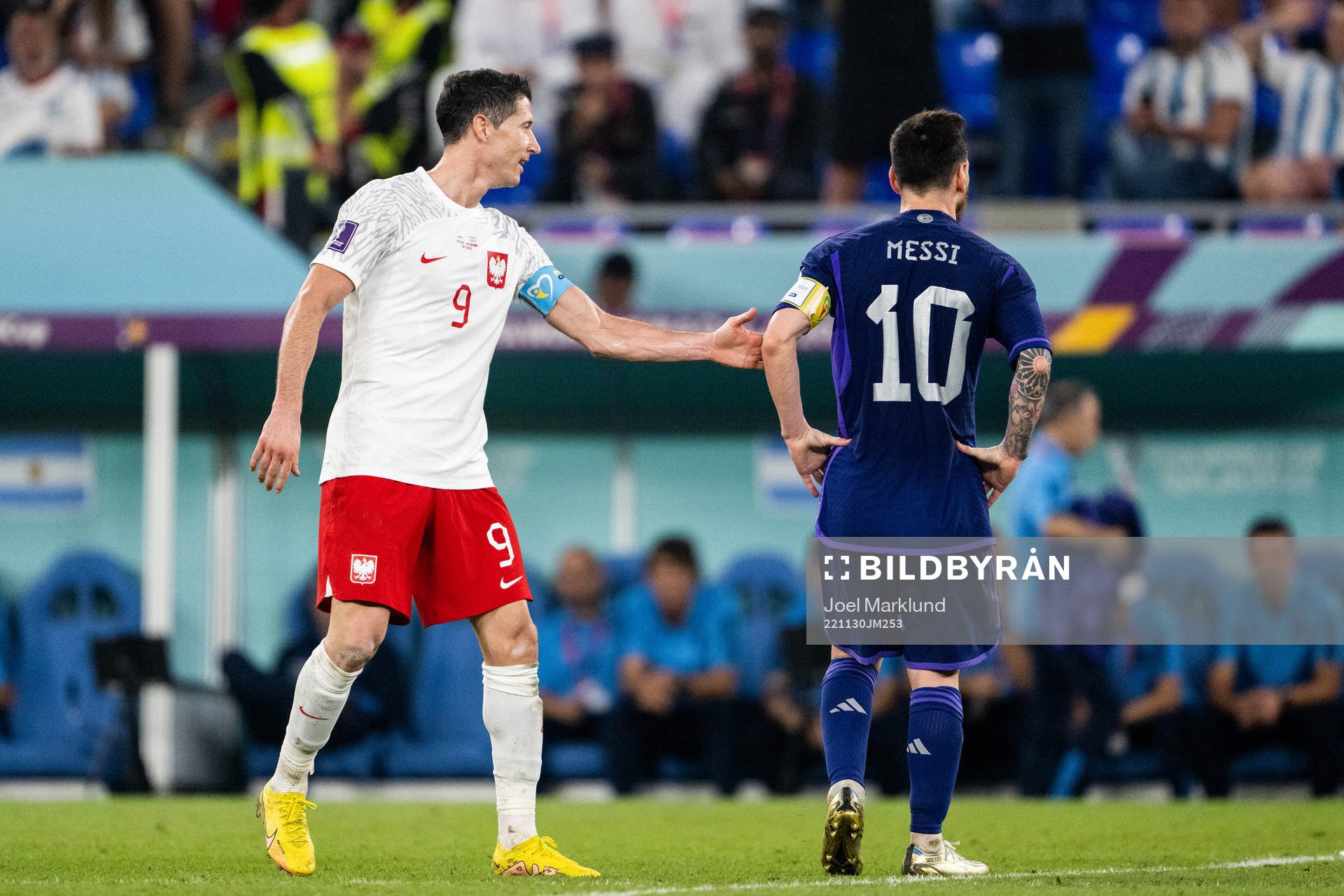 Robert Lewandowski of Poland and Lionel Messi of Argentina
