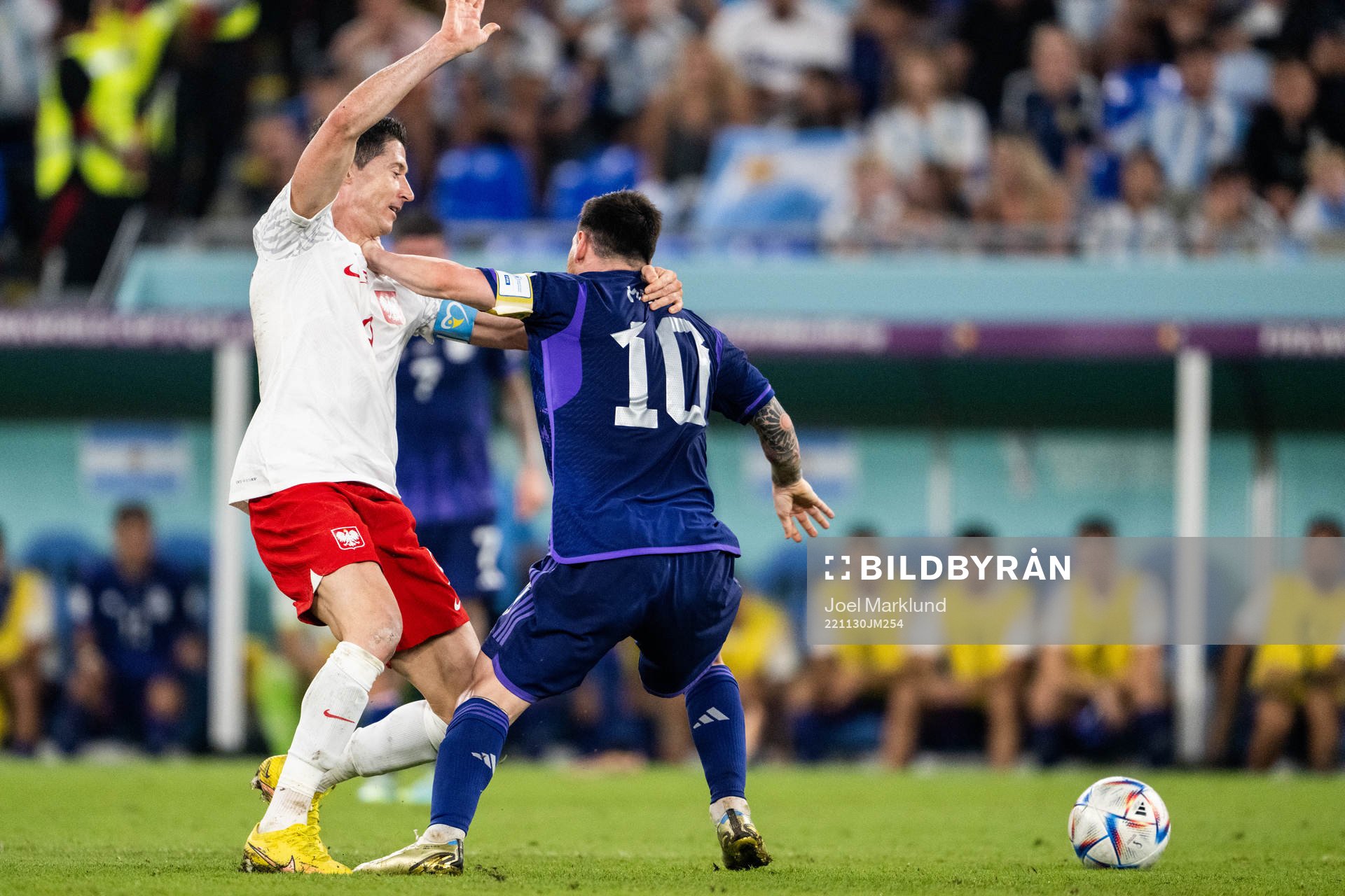 Robert Lewandowski of Poland and Lionel Messi of Argentina