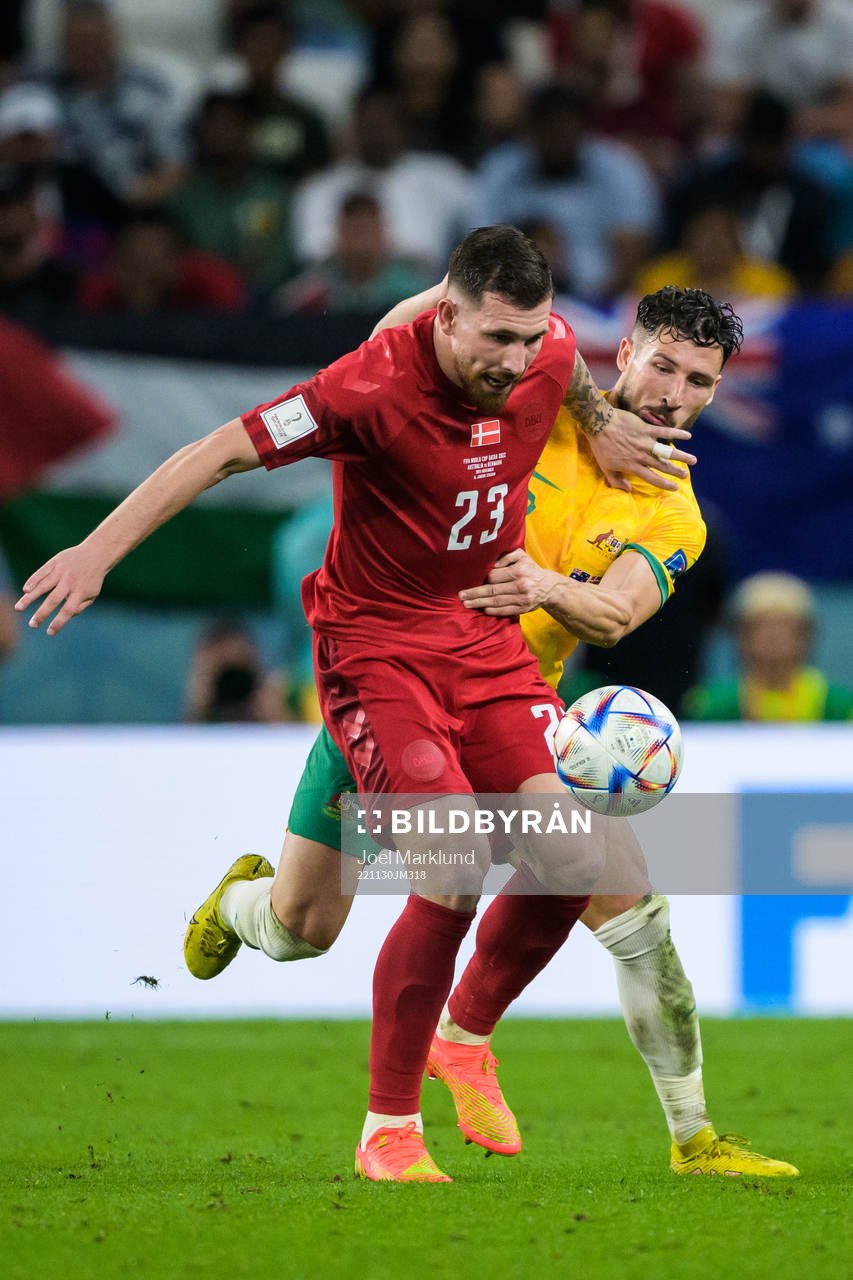 Pierre-Emile Højbjerg of Denmark and Mathew Leckie of Australia during the FIFA World Cup 2022 football match between Australia and Denmark on November 30, 2022 in Doha.