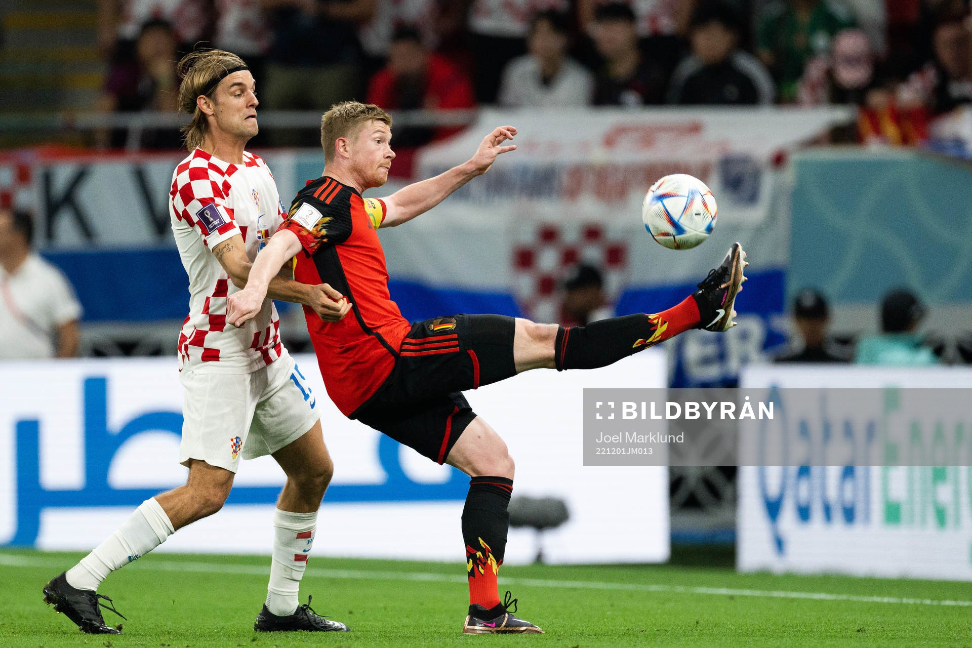 Borna Sosa of Croatia and Kevin de Bruyne of Belgium