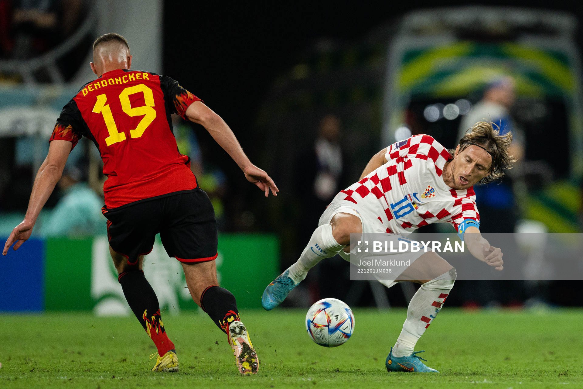 Leander Dendoncker of Belgium and Luka Modric of Croatia