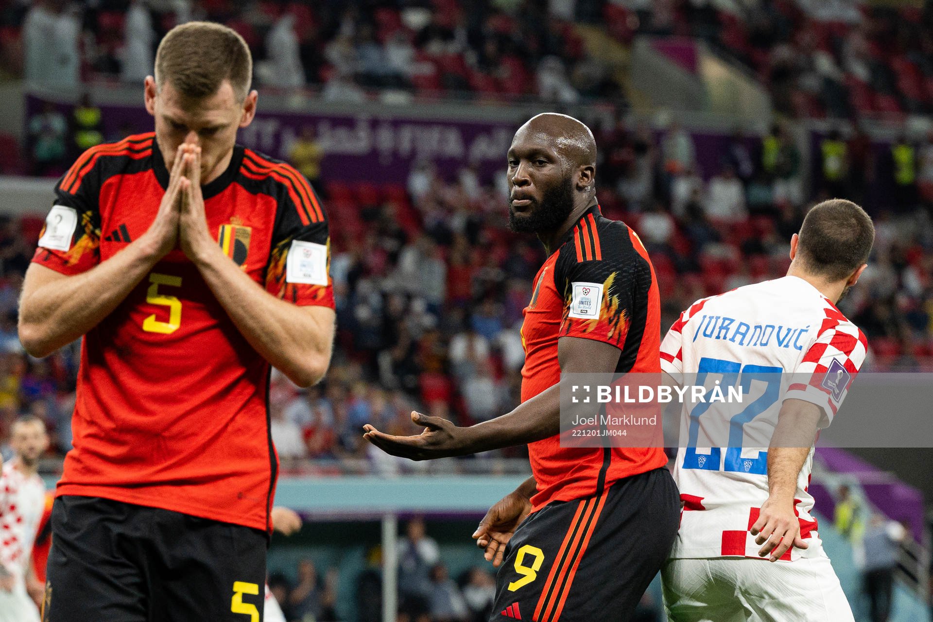 Jan Vertonghen and Romelu Lukaku of Belgium look dejected