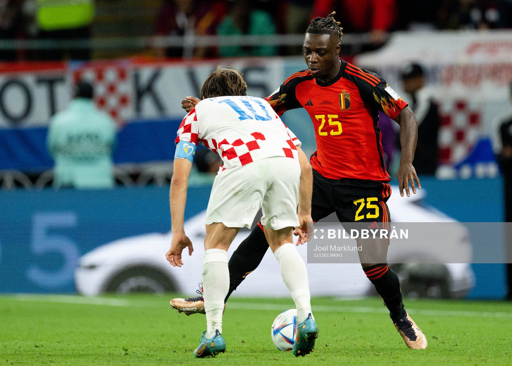 Luka Modric of Croatia and Jeremy Doku of Belgium