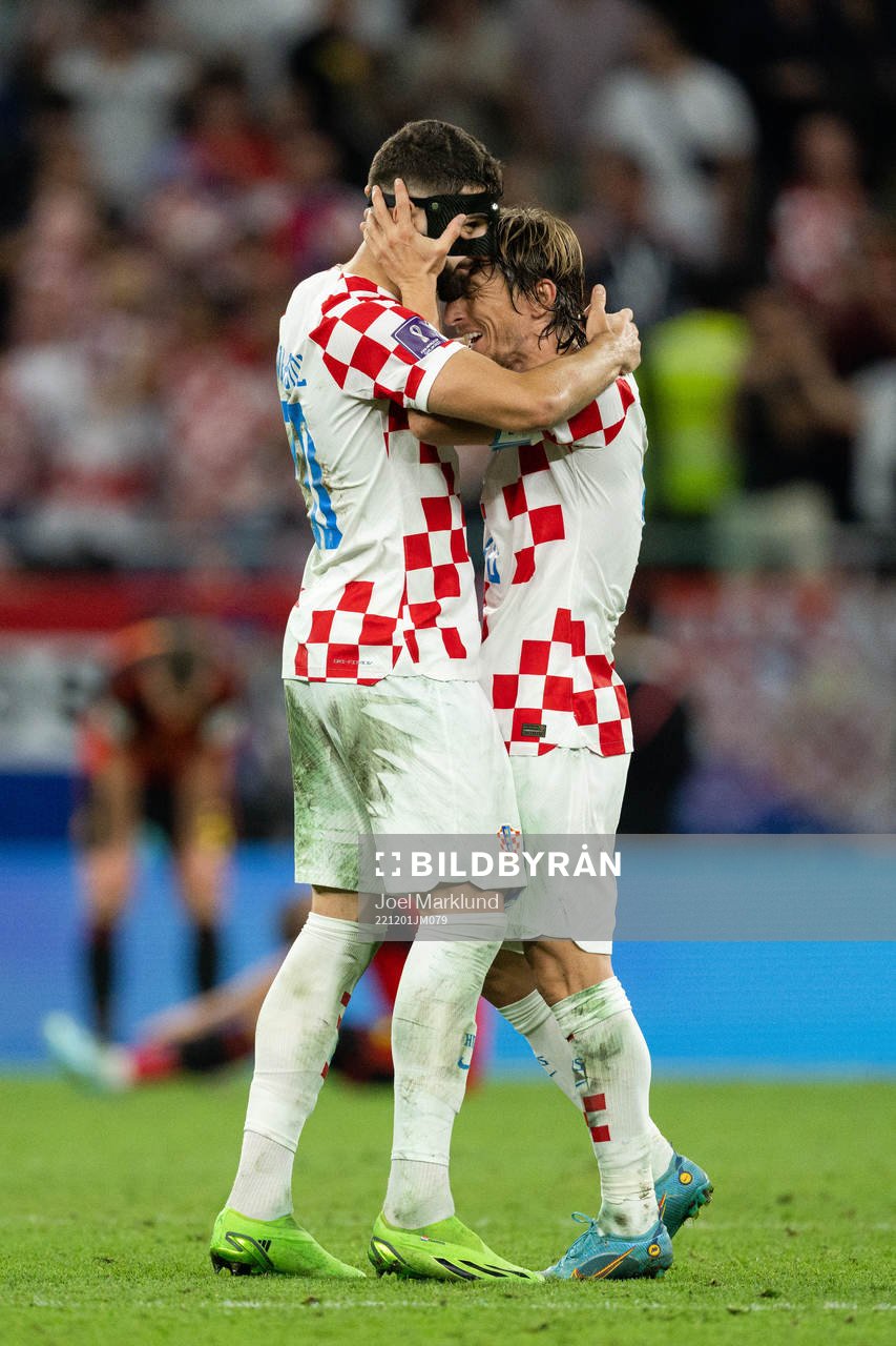 Josko Gvardiol and Luka Modric of Croatia celebrate after the FIFA World Cup 2022 football match between Croatia and Belgium on December 1, 2022 in Doha.