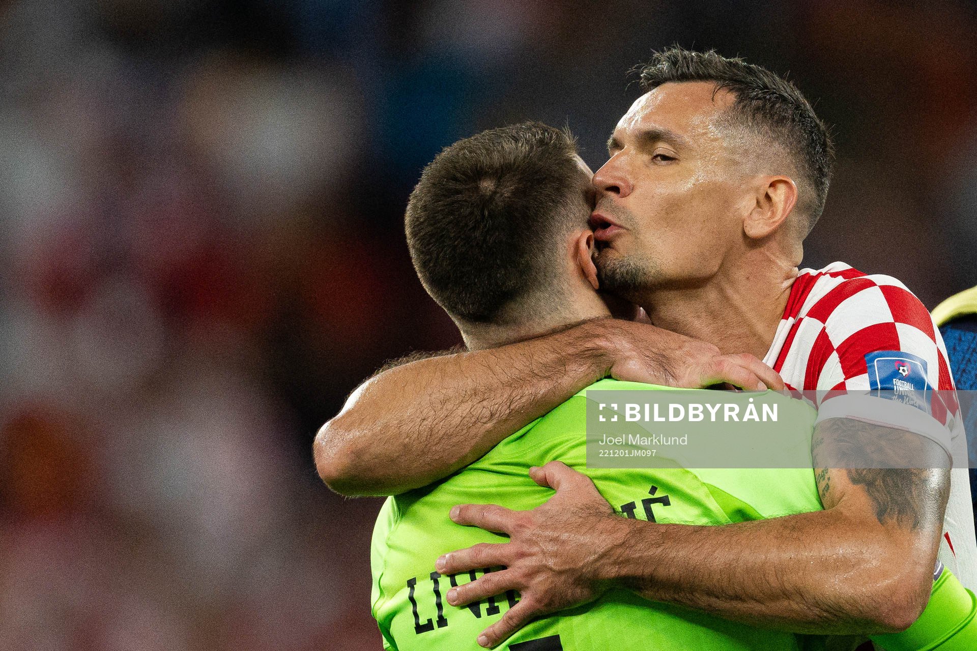 goalkeeper Dominik Livakovic and Dejan Lovren of Croatia celebrate after the FIFA World Cup 2022 football match between Croatia and Belgium on December 1, 2022 in Doha.