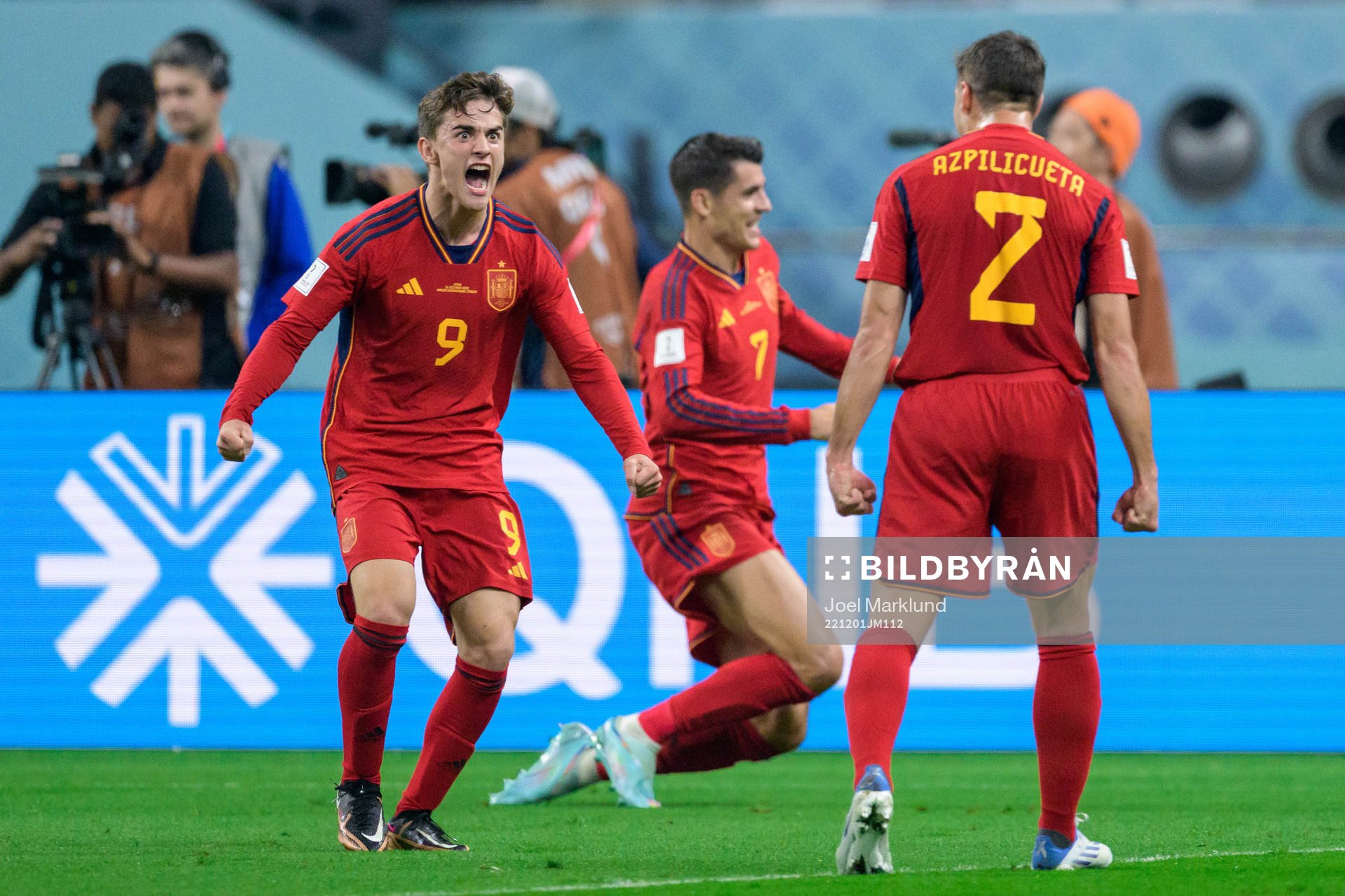 Gavi, Alvaro Morata and Cesar Azpilicueta of Spain celebrate