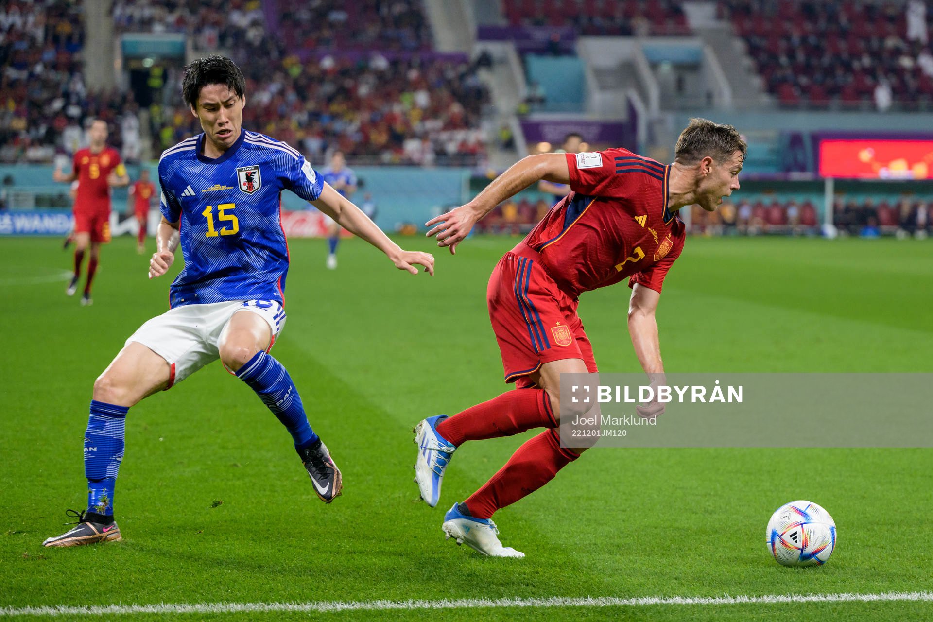 Daichi Kamada of Japan and Cesar Azpilicueta of Spain