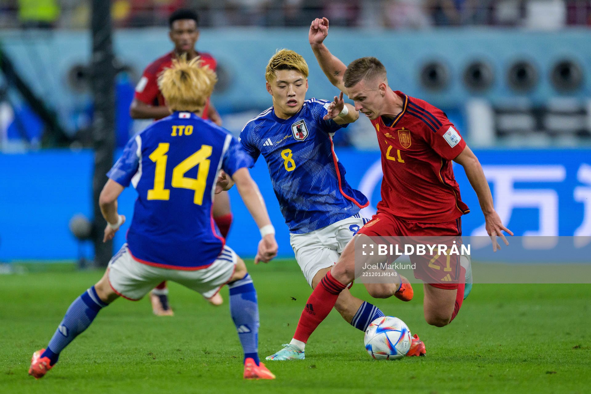 Junya Ito and Ritsu Doan of Japan against Dani Olmo of Spain