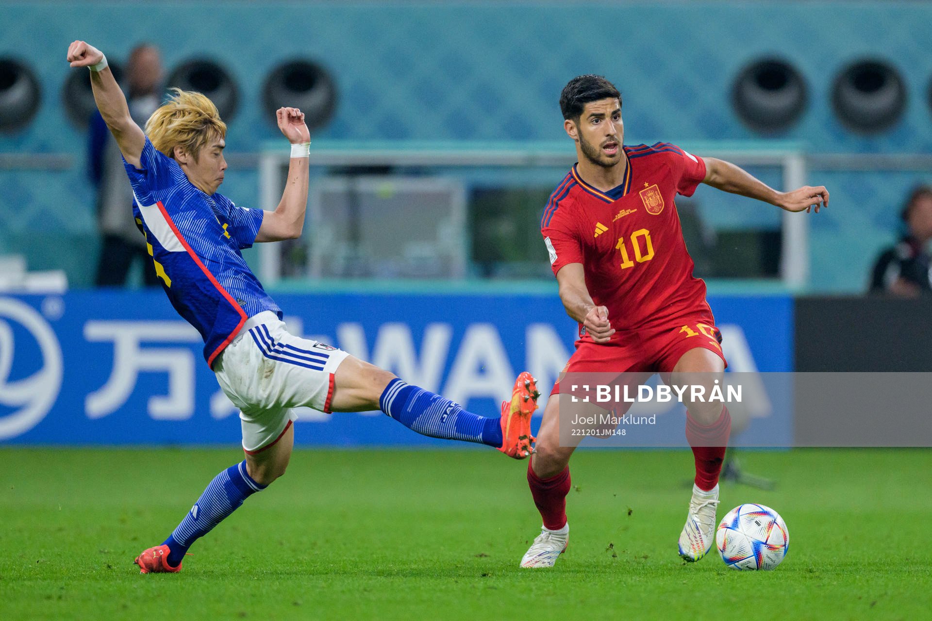 Junya Ito of Japan and Marco Asensio of Spain