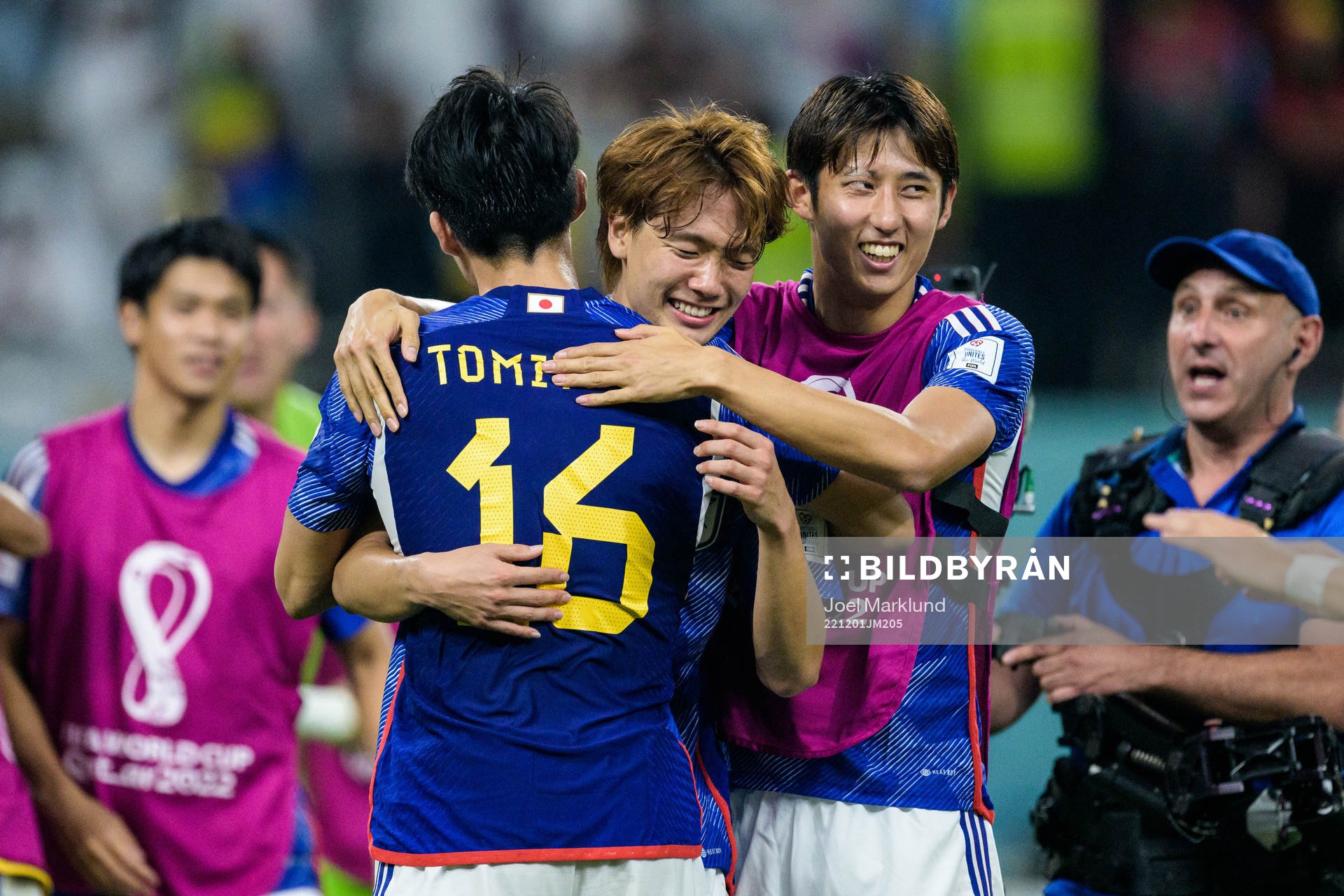 Takehiro Tomiyasu, Kou Itakura and Hiroki Ito of Japan celebrate after the FIFA World Cup 2022 football match between Japan and Spain on December 1, 2022 in Doha.