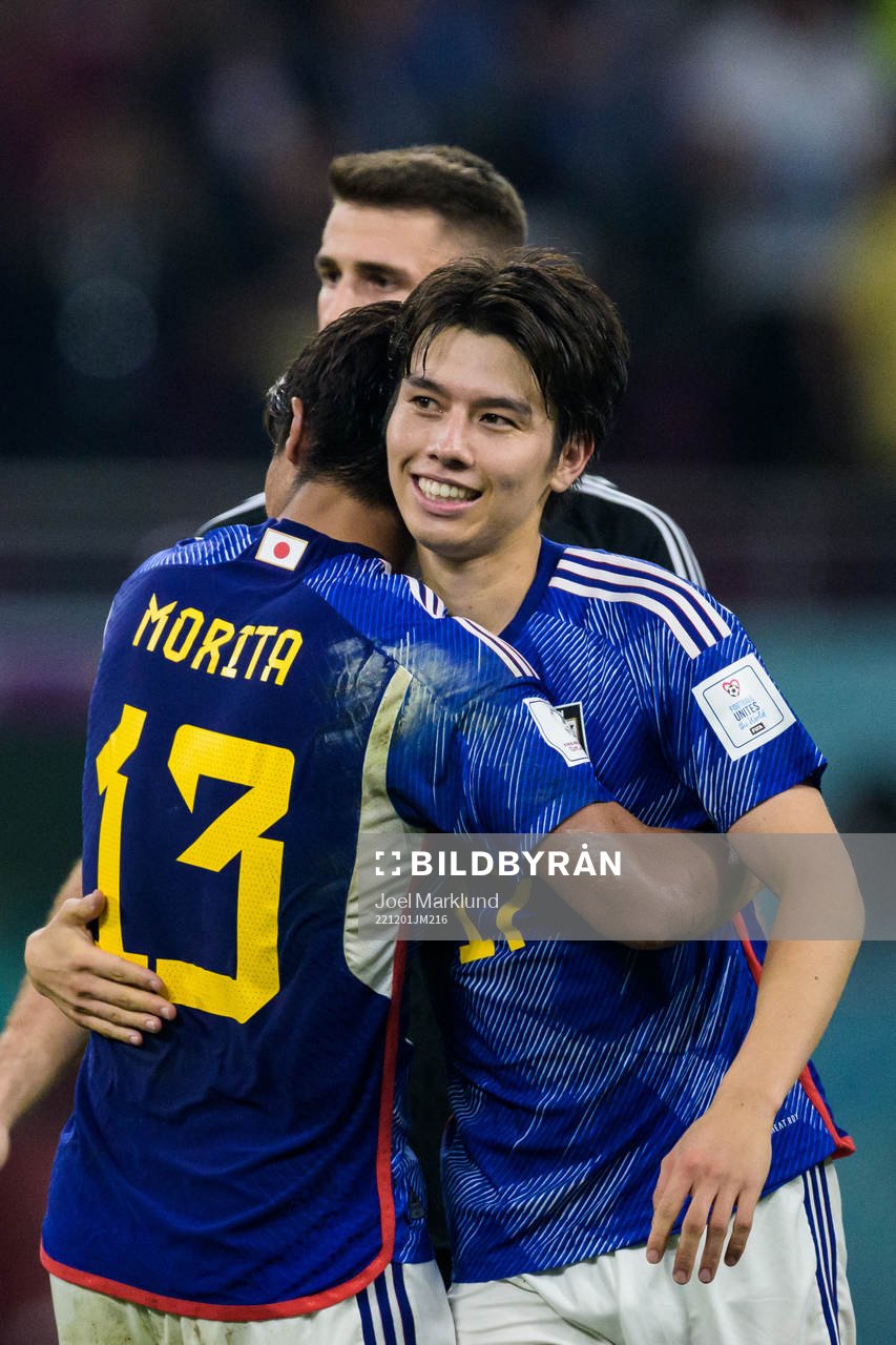Hidemasa Morita and Ao Tanaka of Japan celebrate