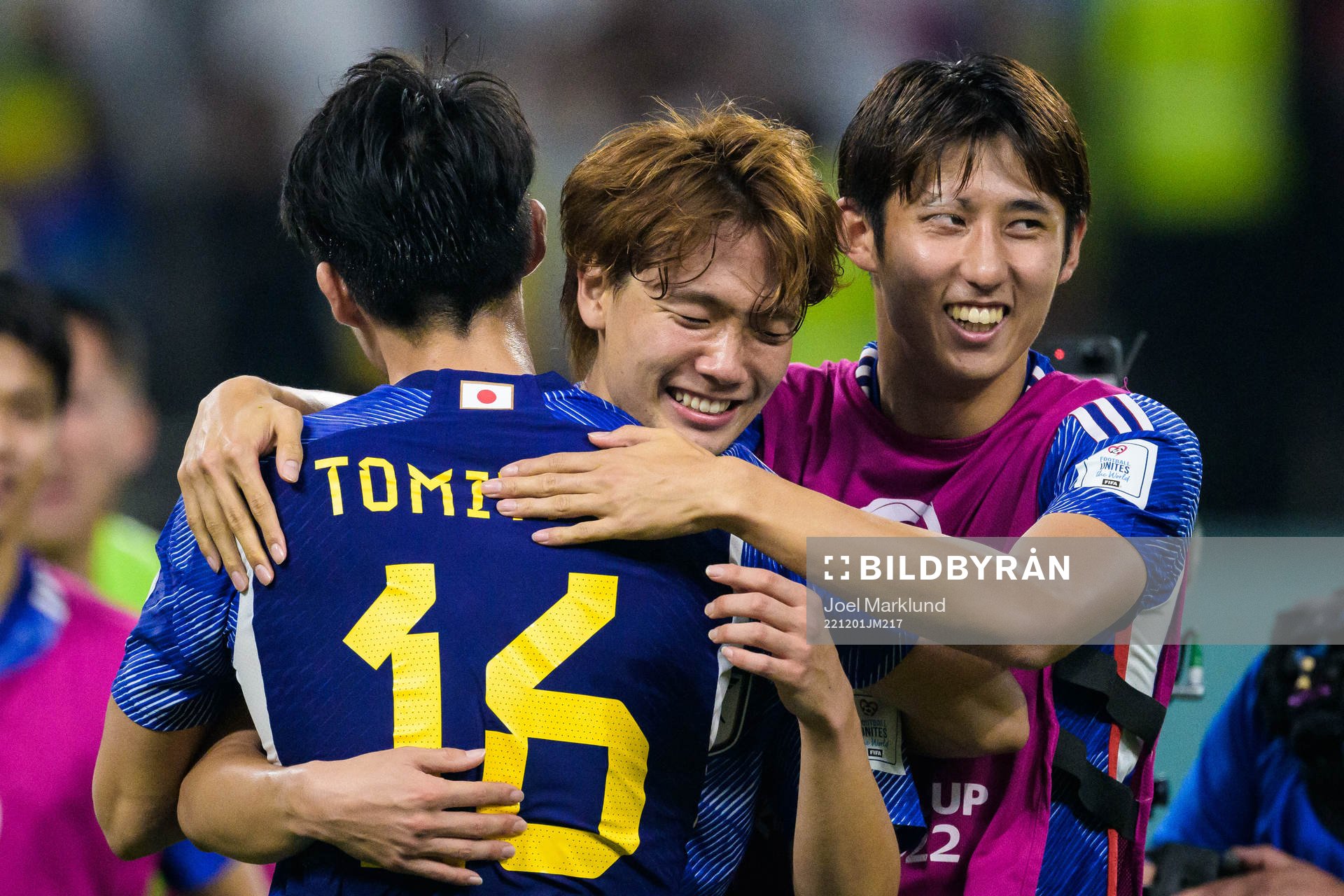 Takehiro Tomiyasu, Kou Itakura and Hiroki Ito of Japan celebrate after the FIFA World Cup 2022 football match between Japan and Spain on December 1, 2022 in Doha.