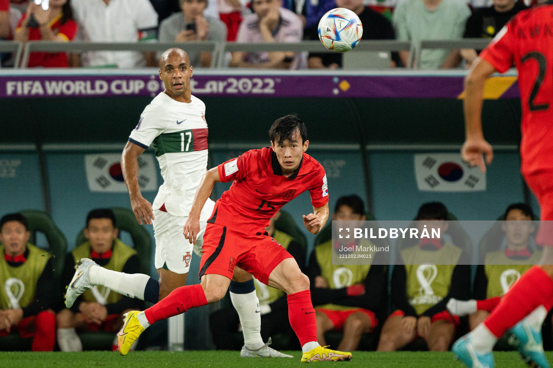 Joao Mario of Portugal and Moonhwan Kim of South Korea