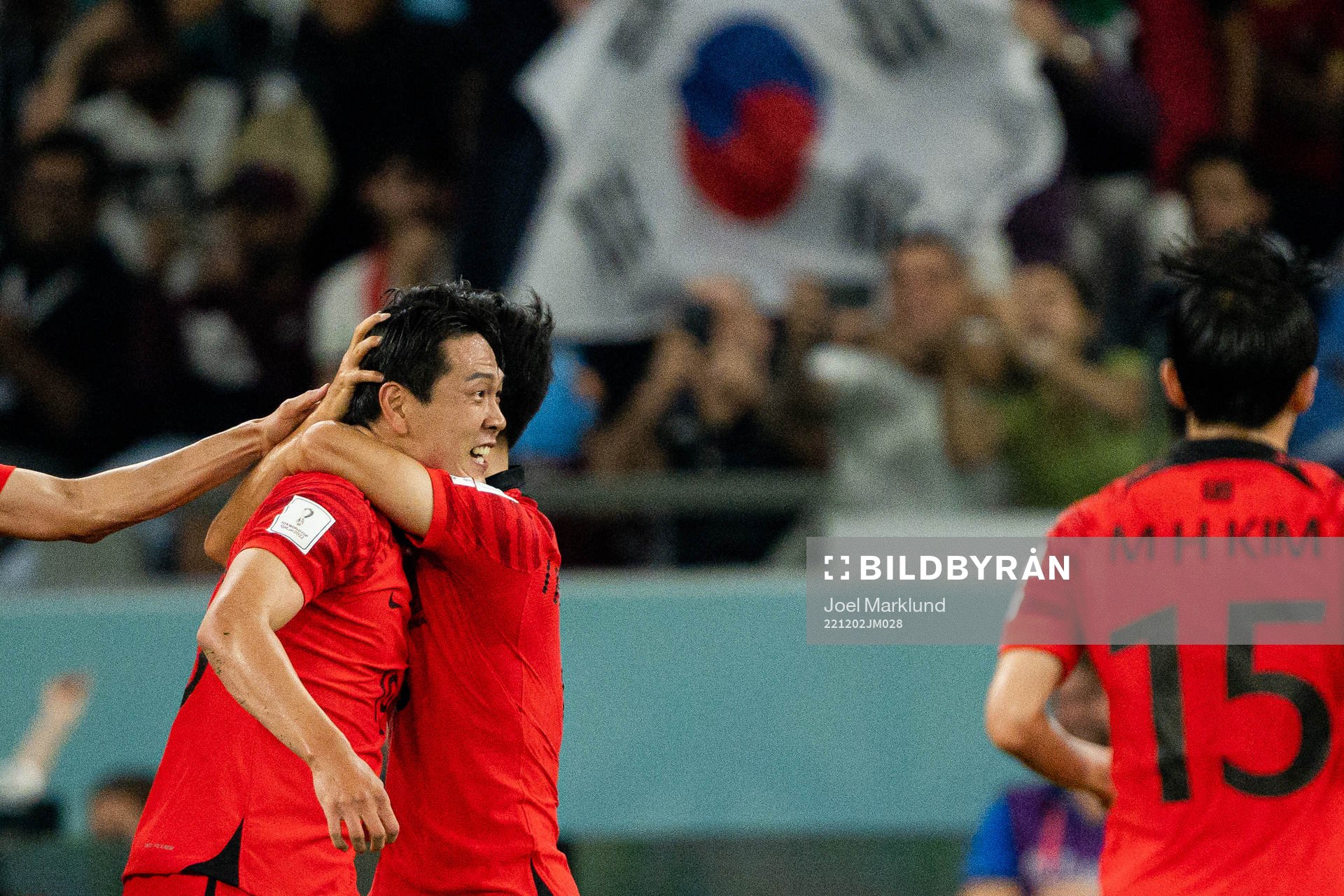 Younggwon Kim and Inbeom Hwang of South Korea celebrate the