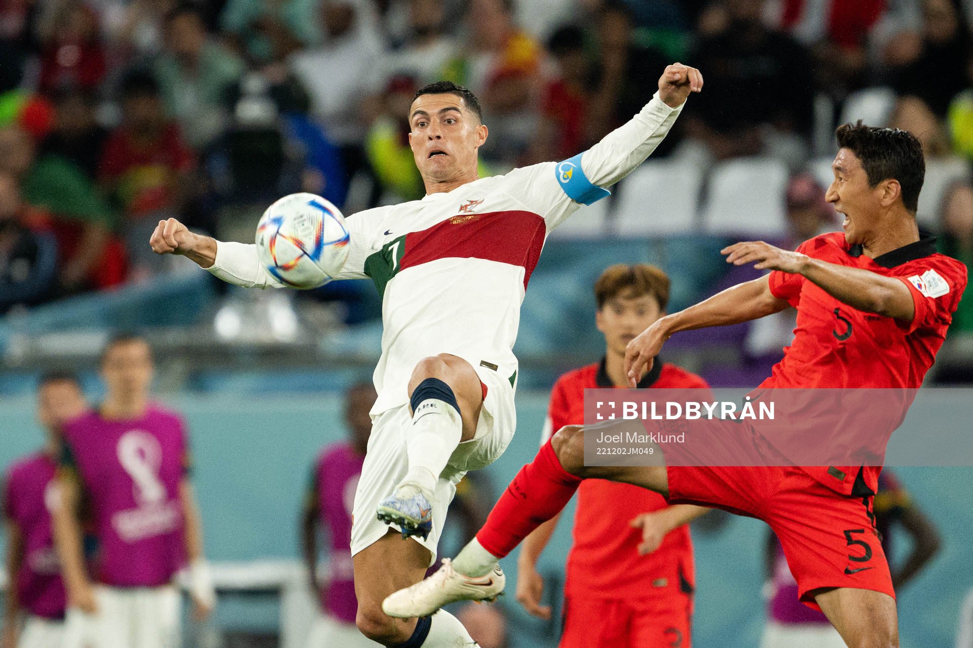 Cristiano Ronaldo of Portugal and Wooyoung Jung of South