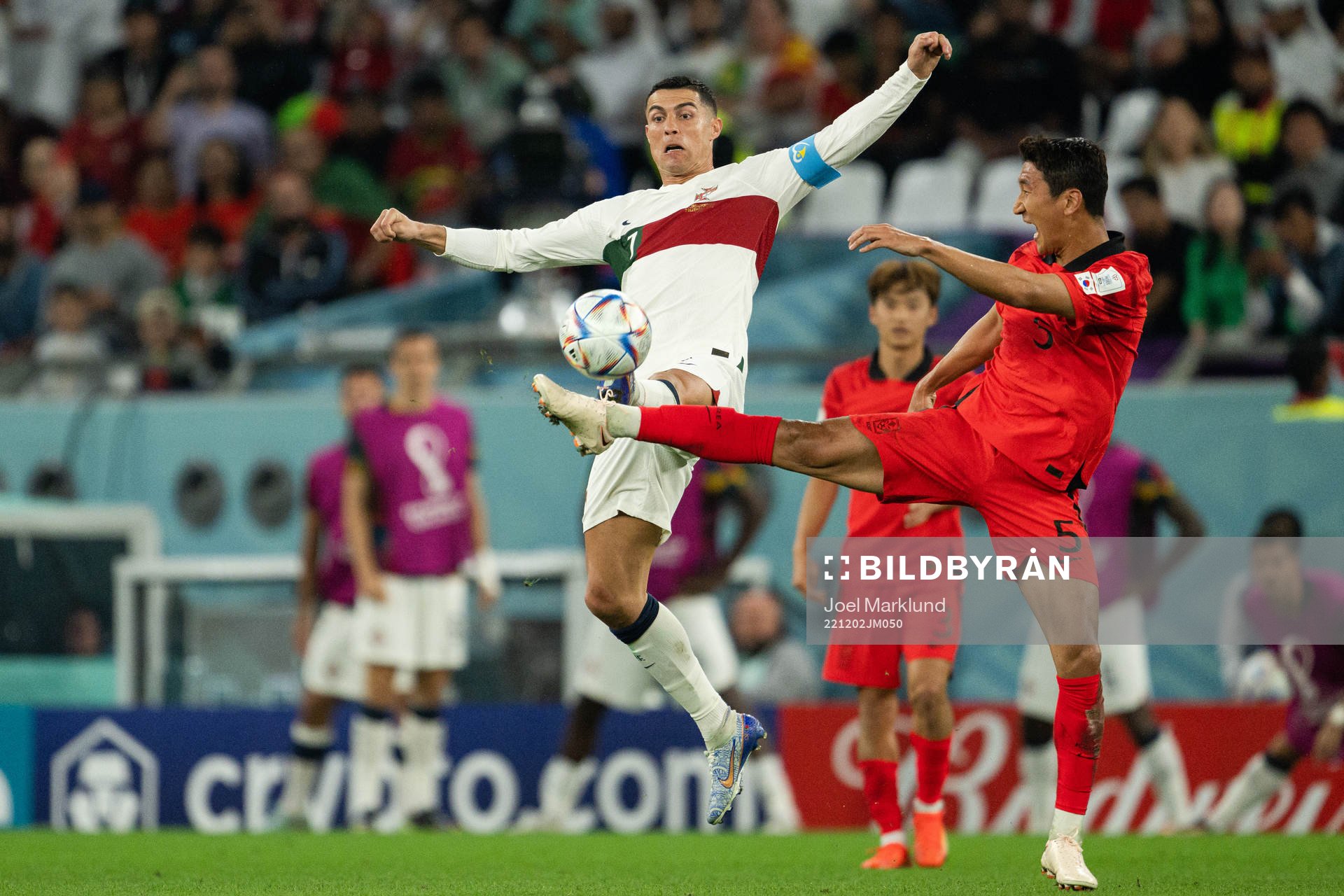Cristiano Ronaldo of Portugal and Wooyoung Jung of South