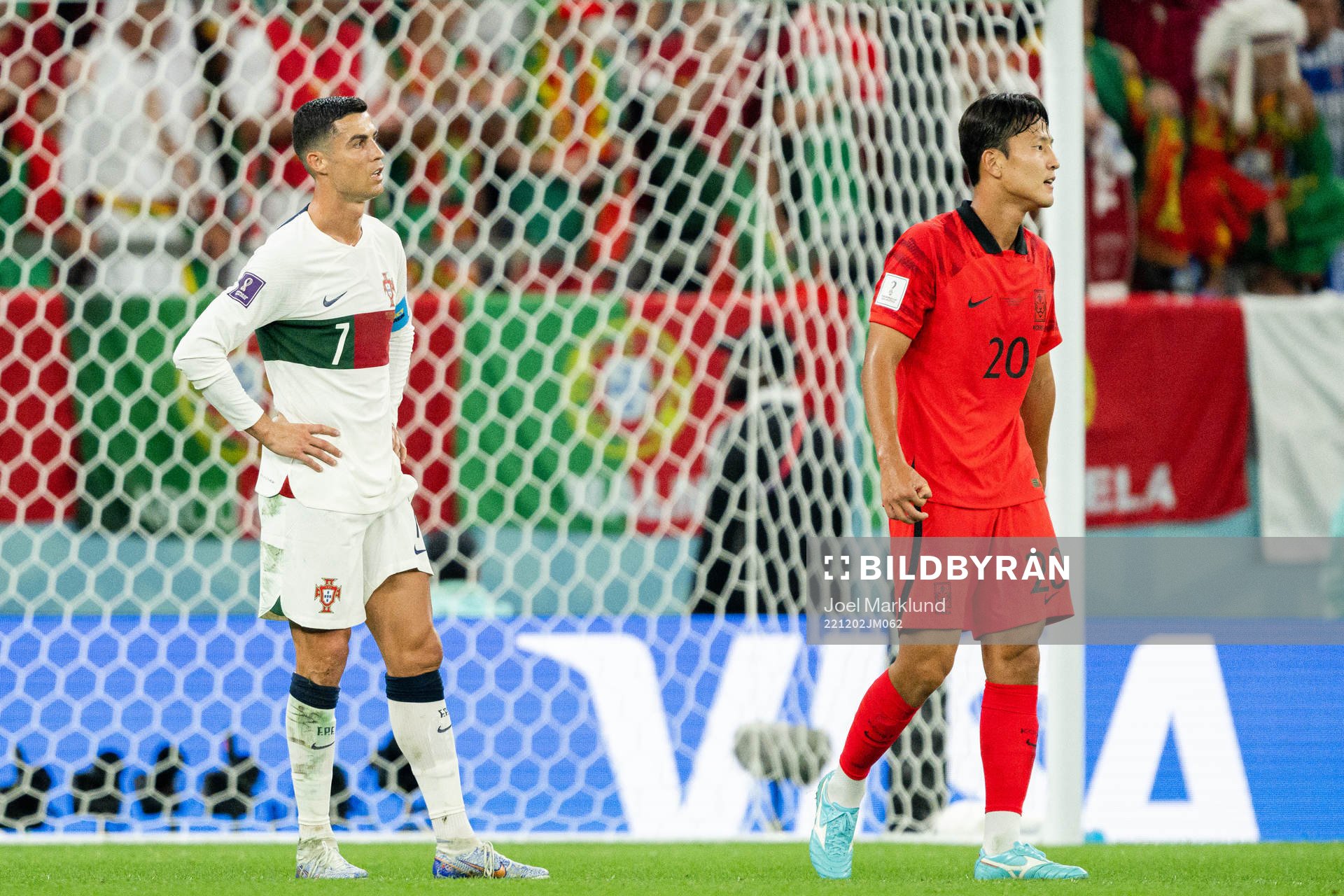 Cristiano Ronaldo of Portugal and Kyungwon Kwon of South