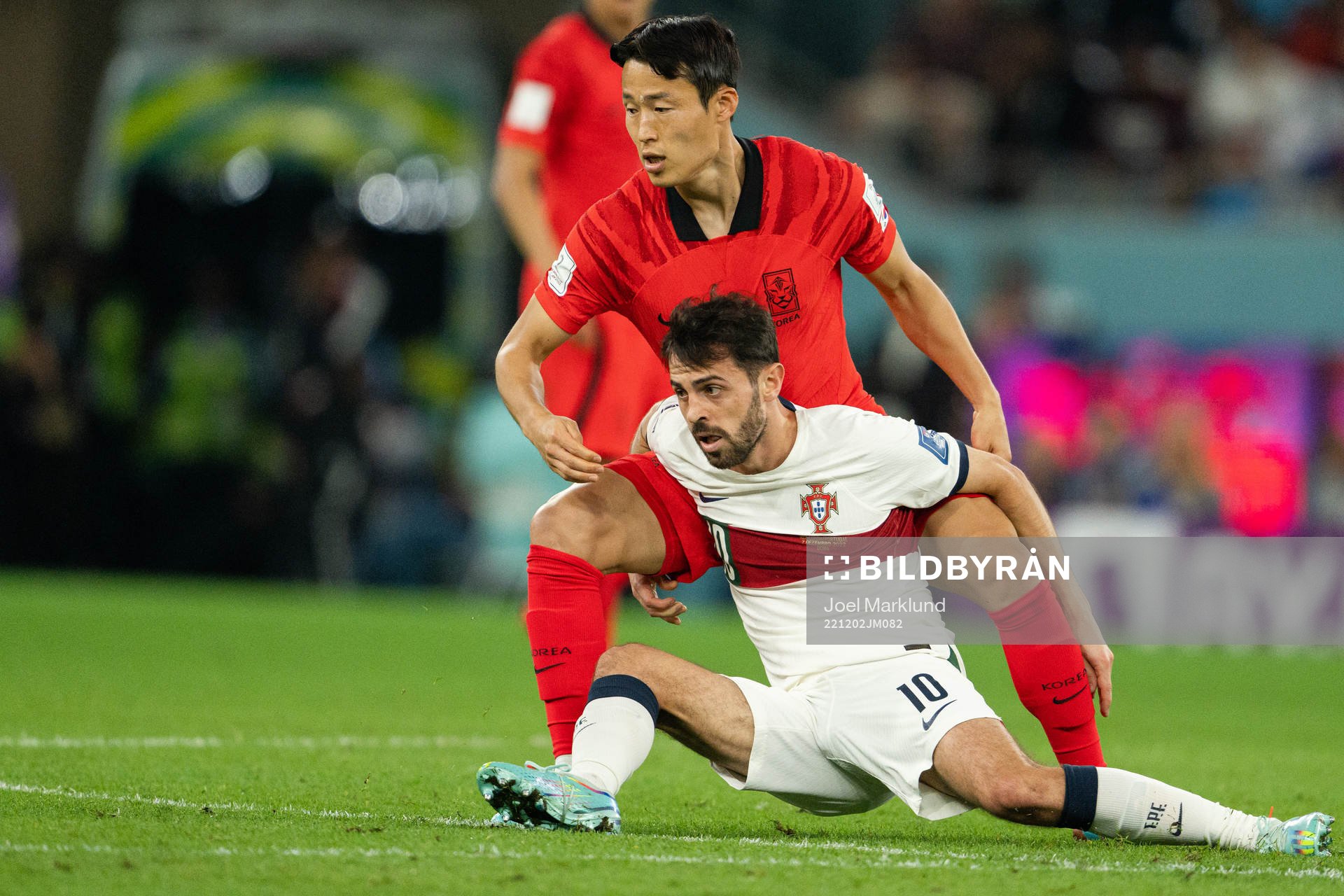 Junho Son of South Korea and Bernardo Silva of Portugal