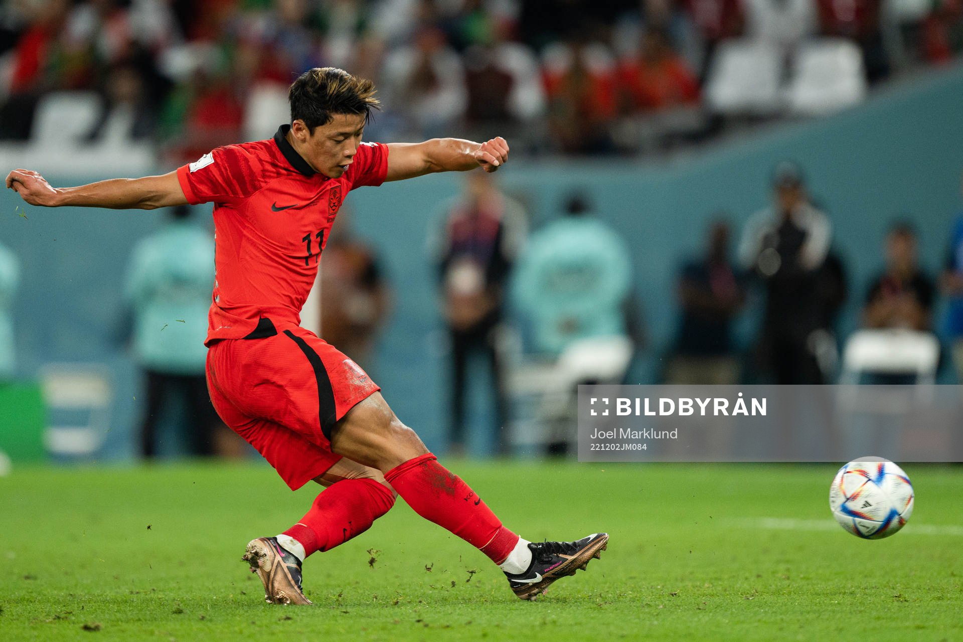Heechan Hwang of South Korea scores the 2-1 goal