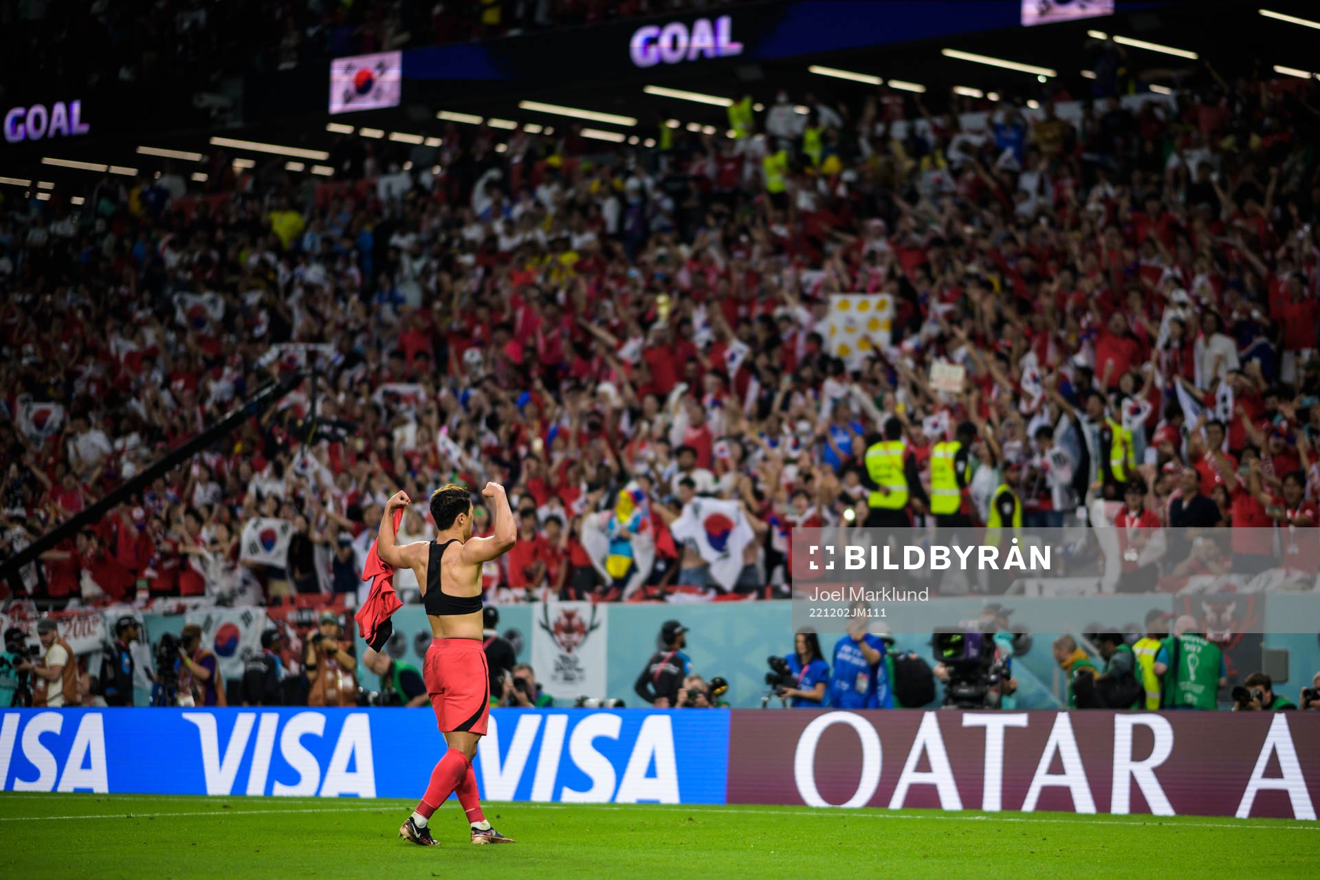 Heechan Hwang of South Korea celebrates his 2-1 goal