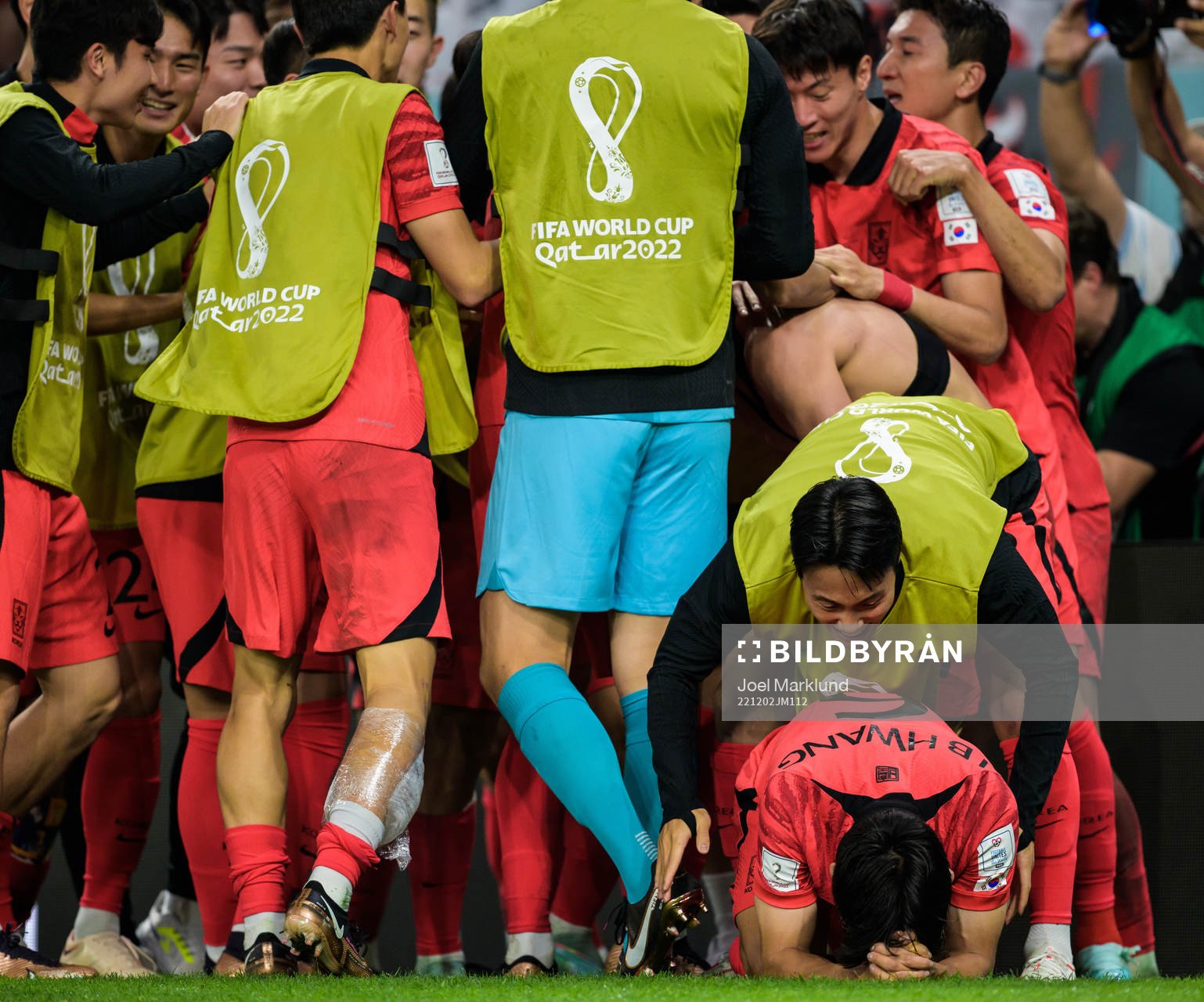 Seungho Paik and Inbeom Hwang of South Korea celebrate the 2-1 goal by Heechan Hwang (not pictured) during the FIFA World Cup 2022 football match between South Korea and Portugal on December 2, 2022 in Doha.