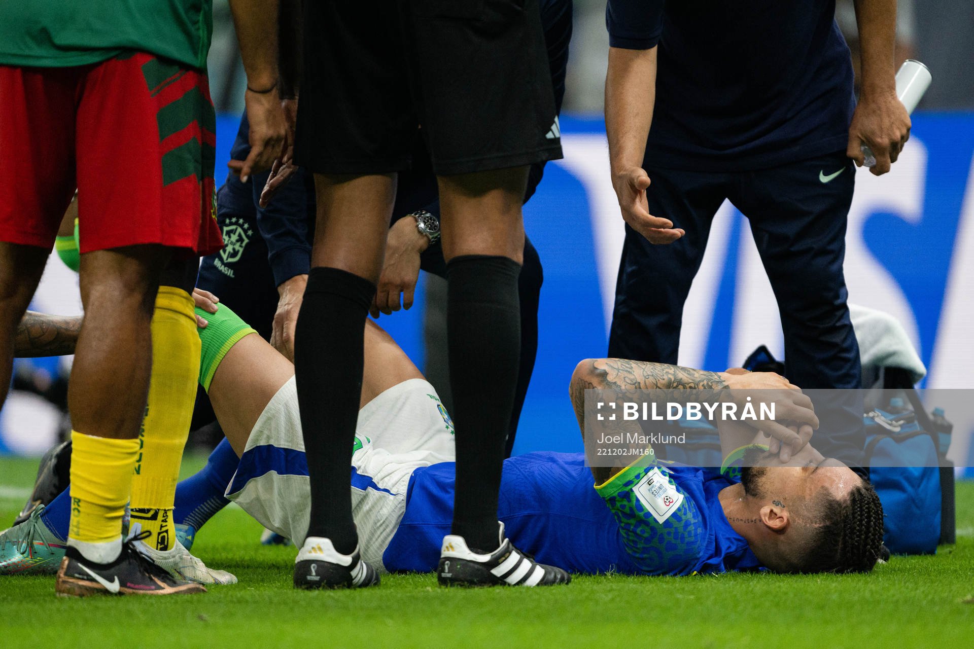 Alex Sandro of Brazil in pain