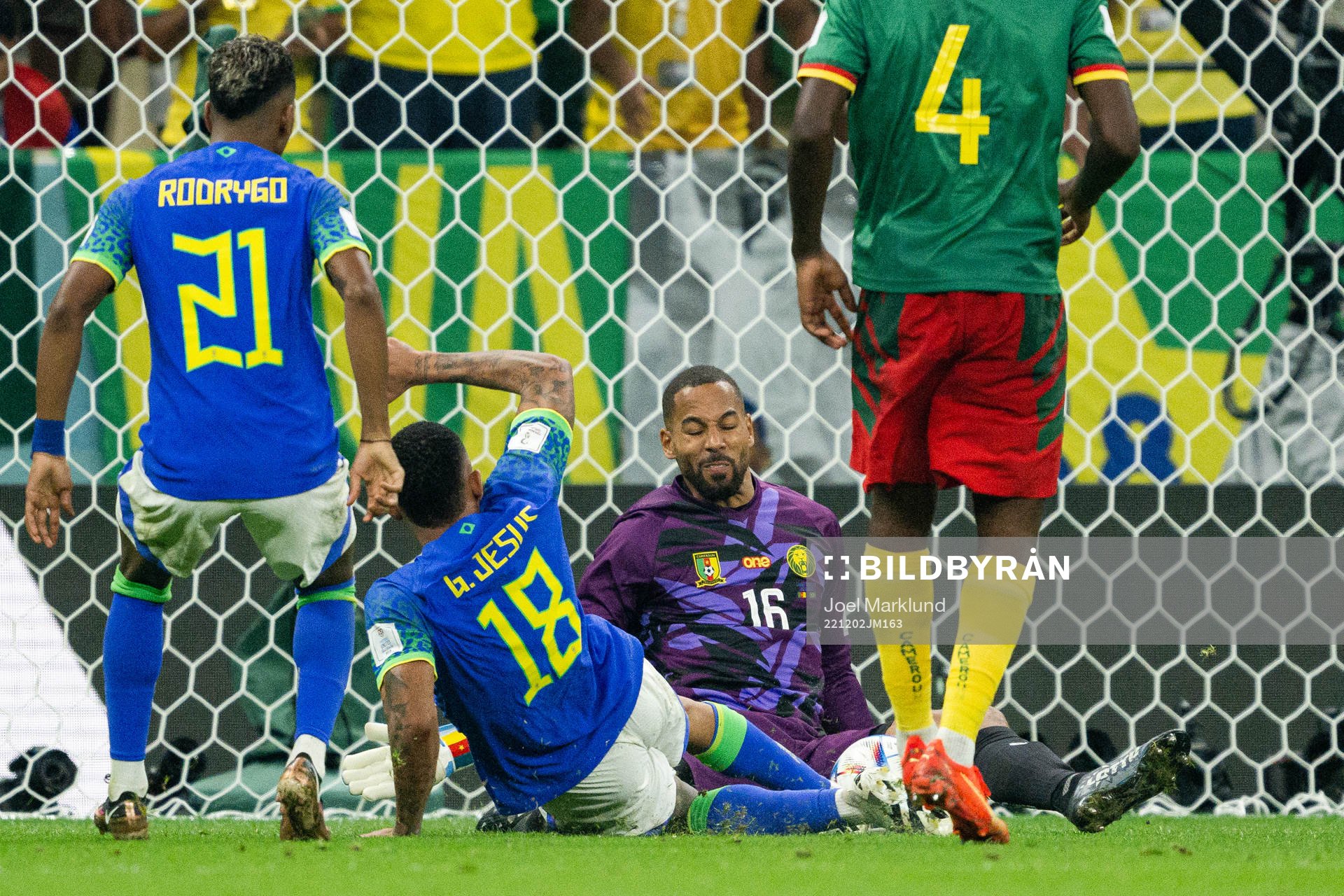 Gabriel Jesus of Brazil abasing goalkeeper Devis Epassy of