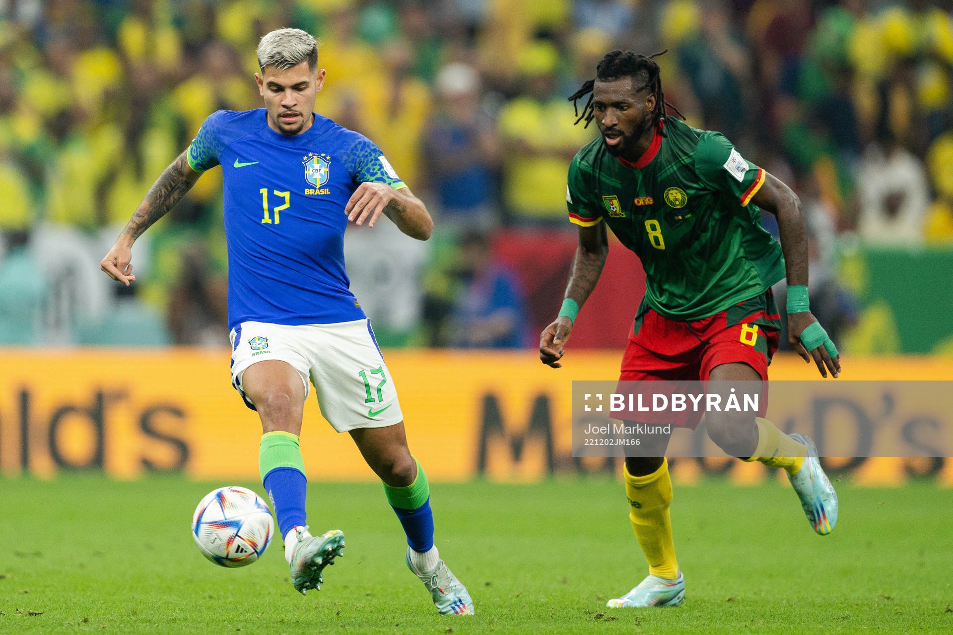 Bruno Guimaraes of Brazil and Andre-Frank Zambo Anguissa of